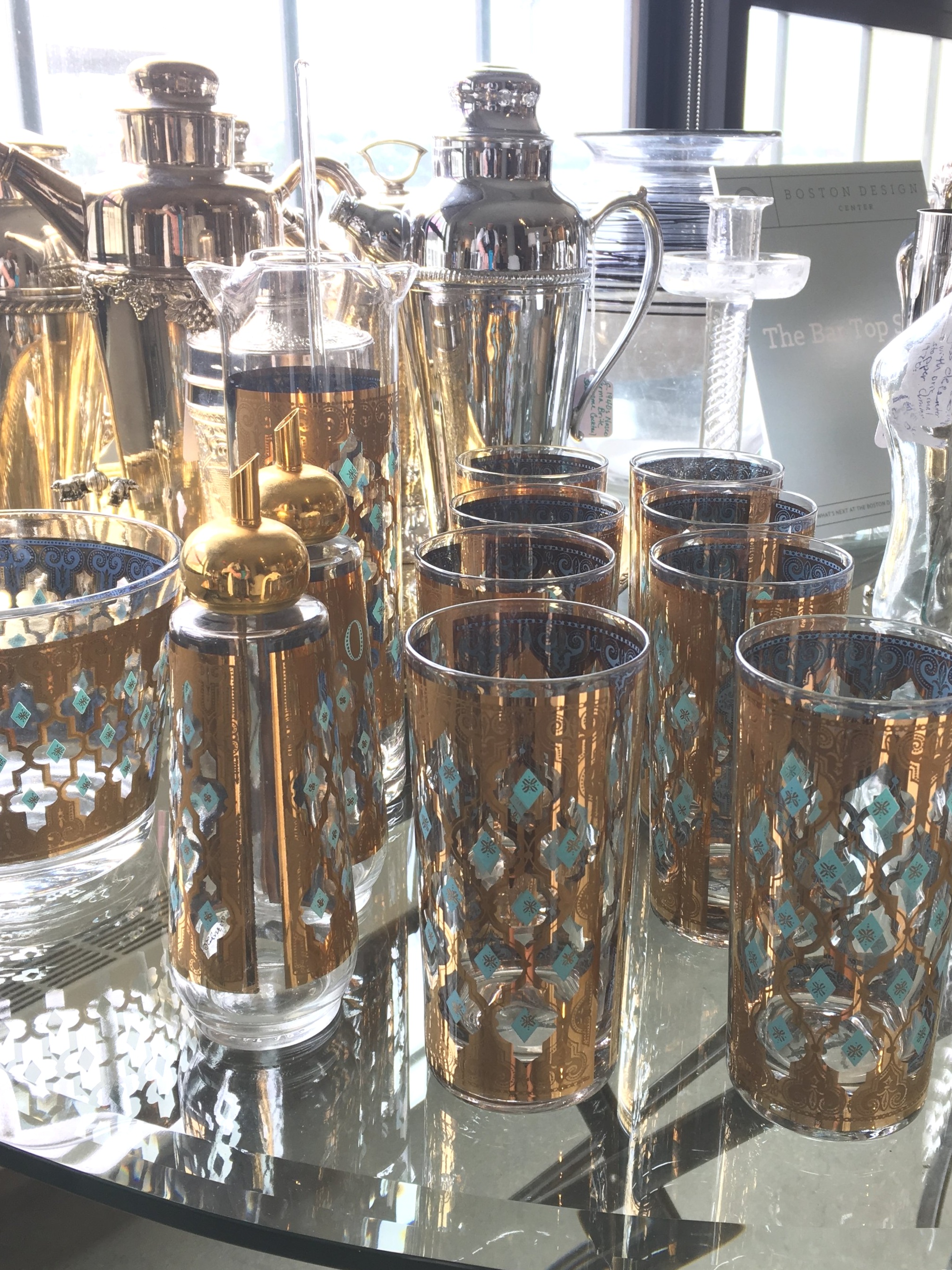 Gold and turquoise barware set