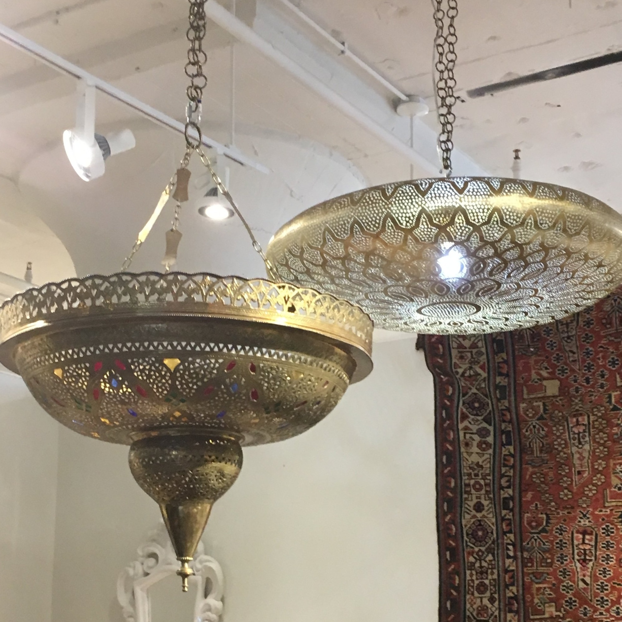 Pierced metal pendants with a Moroccan flair