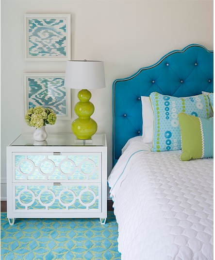 The versatile and brilliant decorator, Phoebe Howard , used these lamps for a punch of accent color in this chic bedroom.