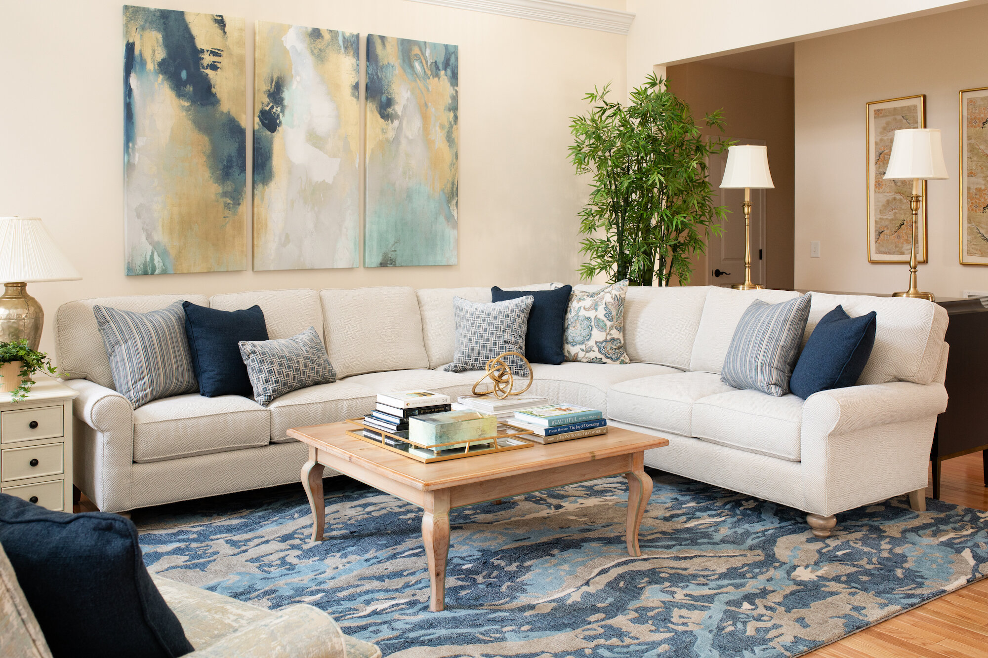 arranging throw pillows on a sectional