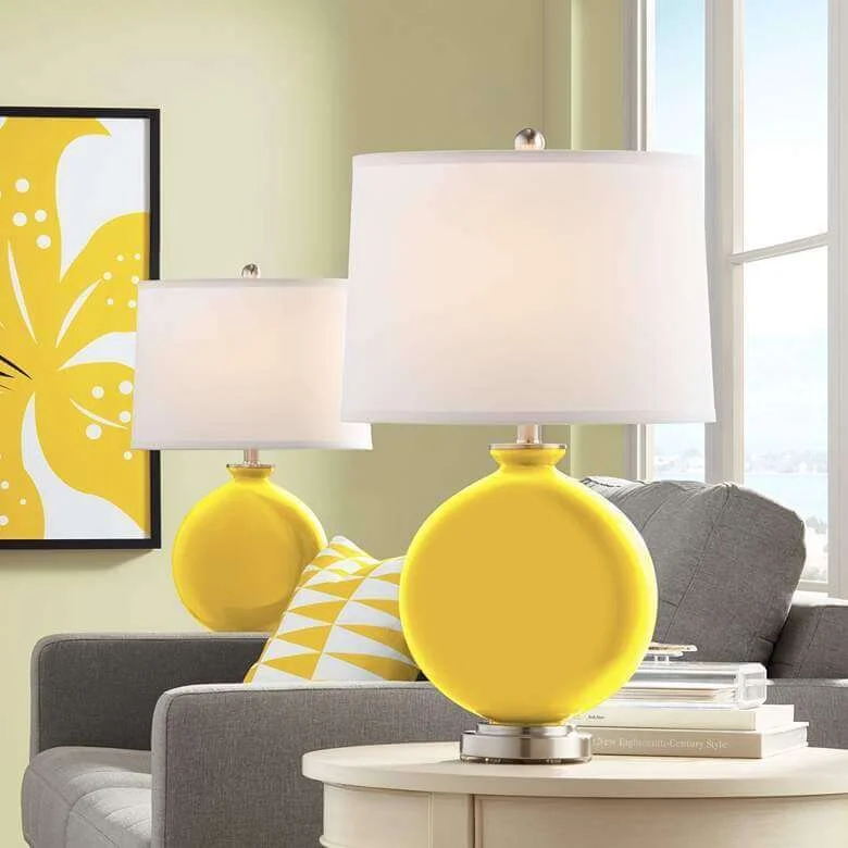 These inexpensive yellow lamps are quite cute (and come in a bunch of other colors).  They remind me a bit of hard candies!
