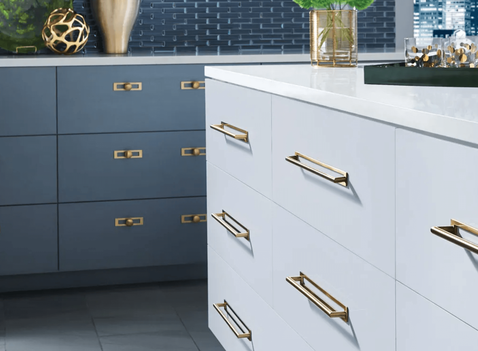 top knobs sleek gold  pulls with an open backplate.png