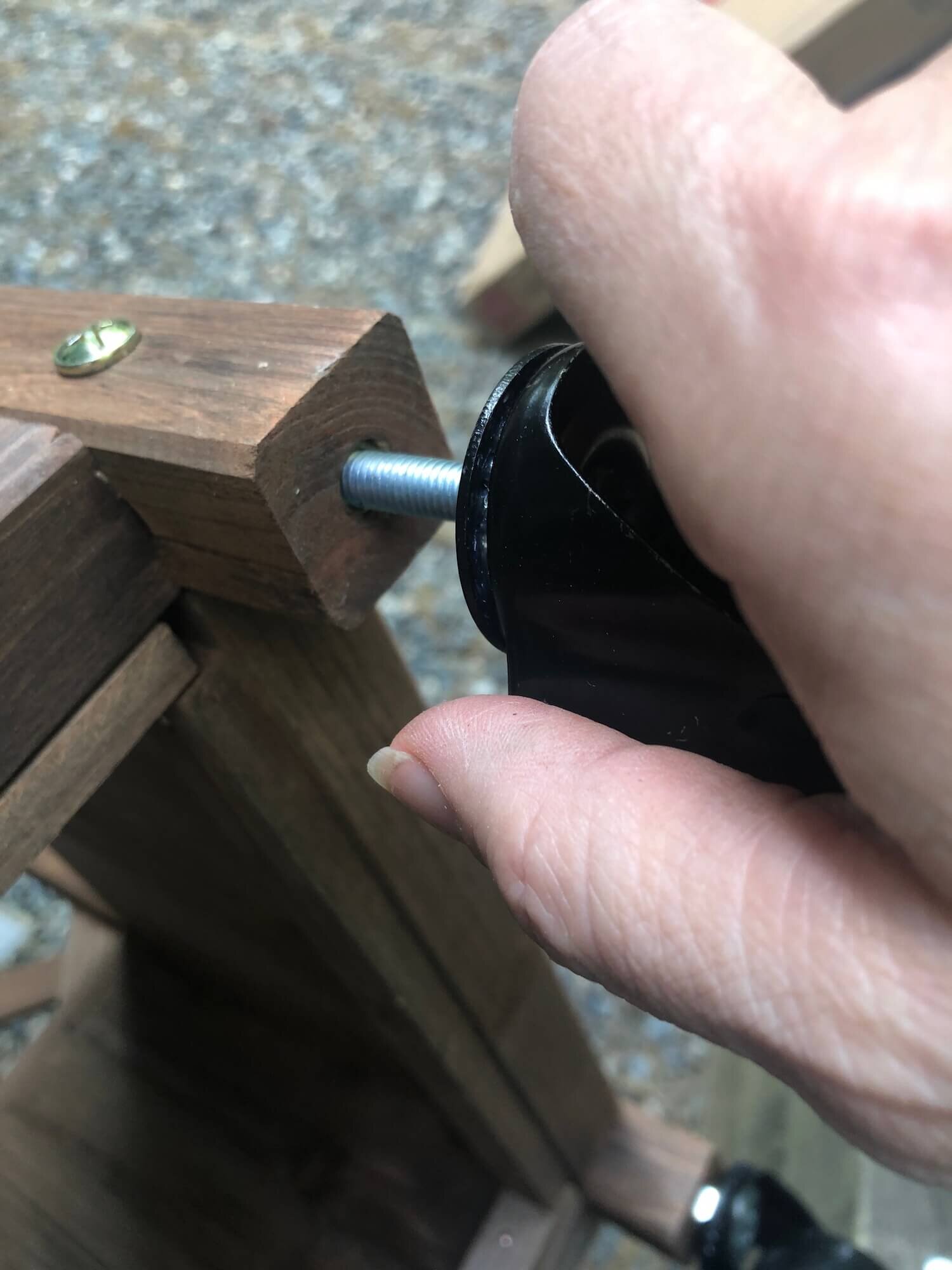 adding the locking caster feet to the trellis planters.JPG