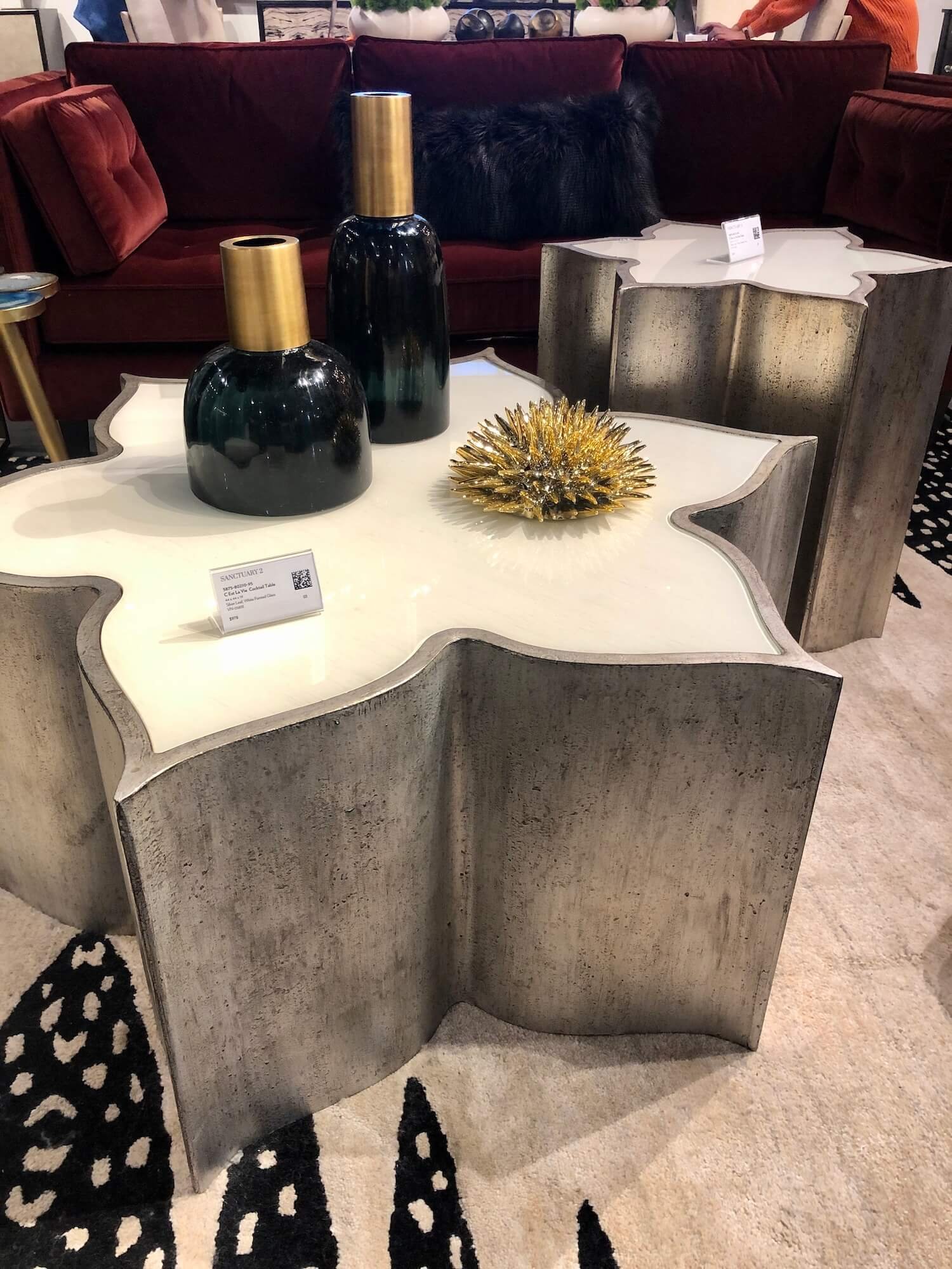 silver and glass flower tables from Hooker