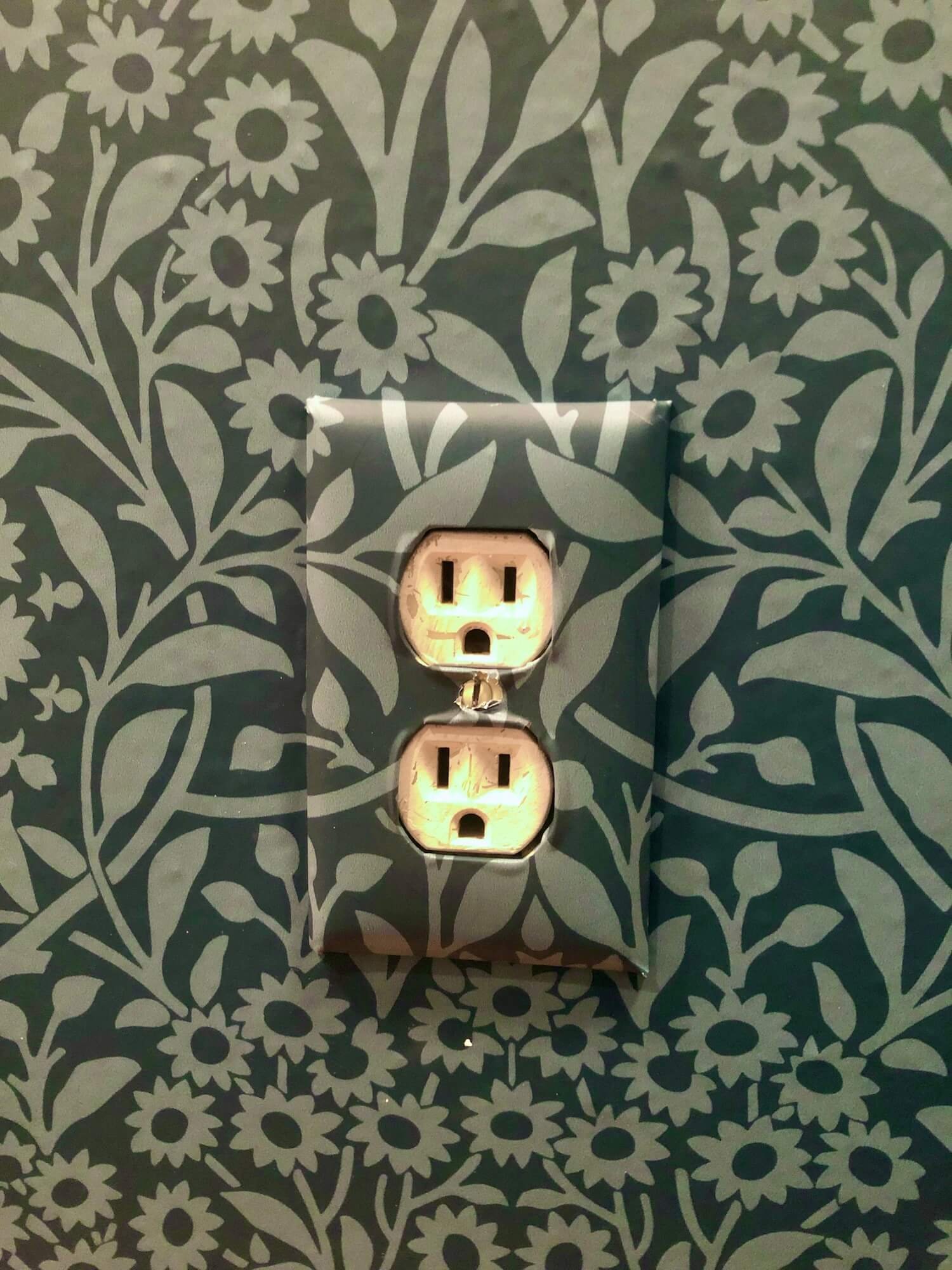 wallpapered outlet cover.jpg