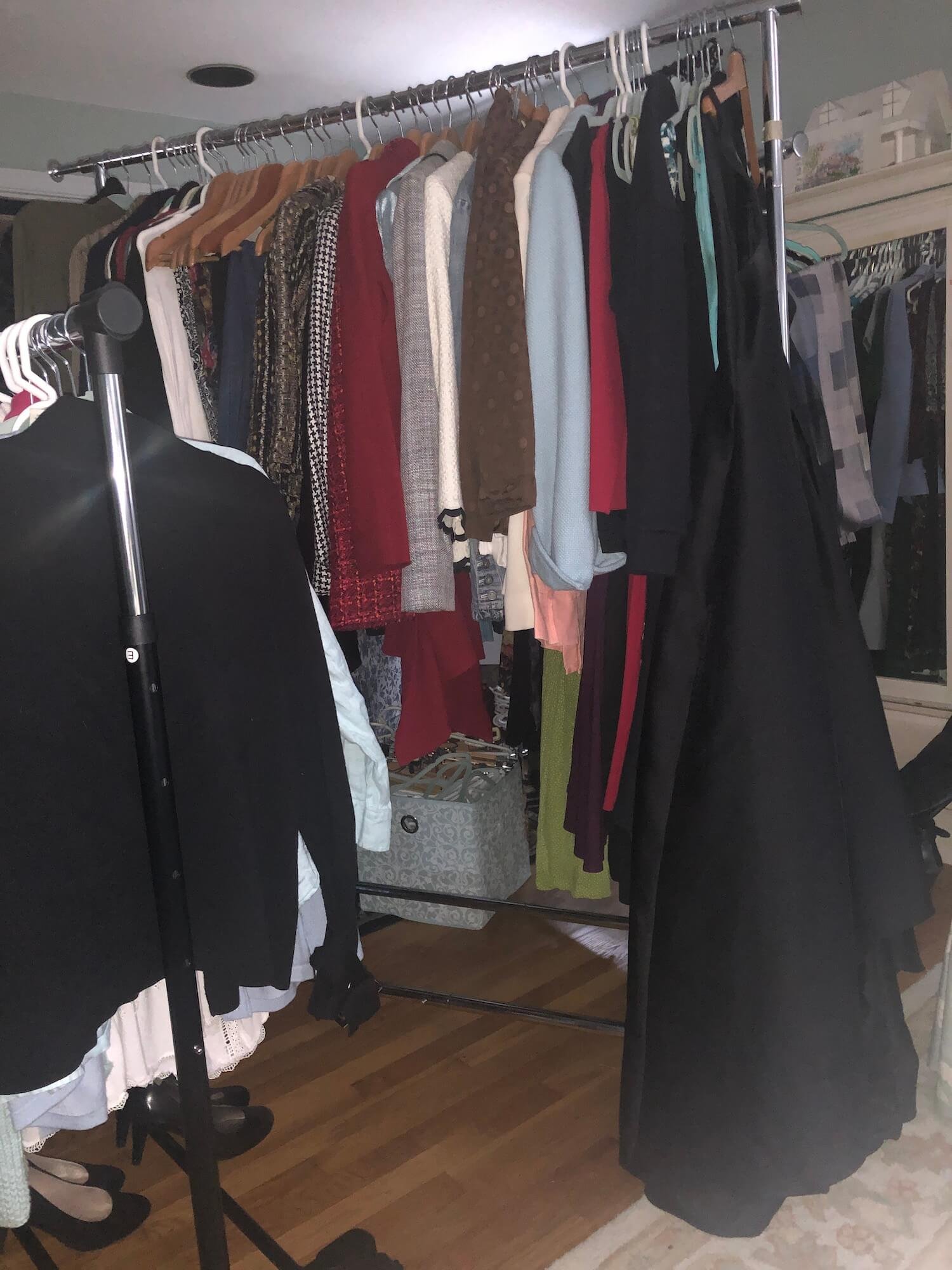 clothes waiting for a closet.JPG