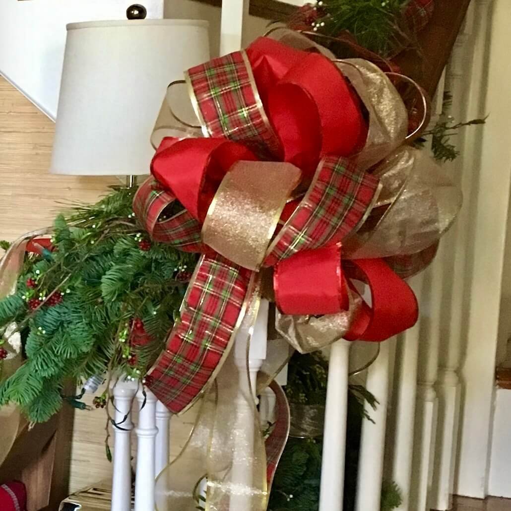 Holiday house stair garland bough closeup.jpeg