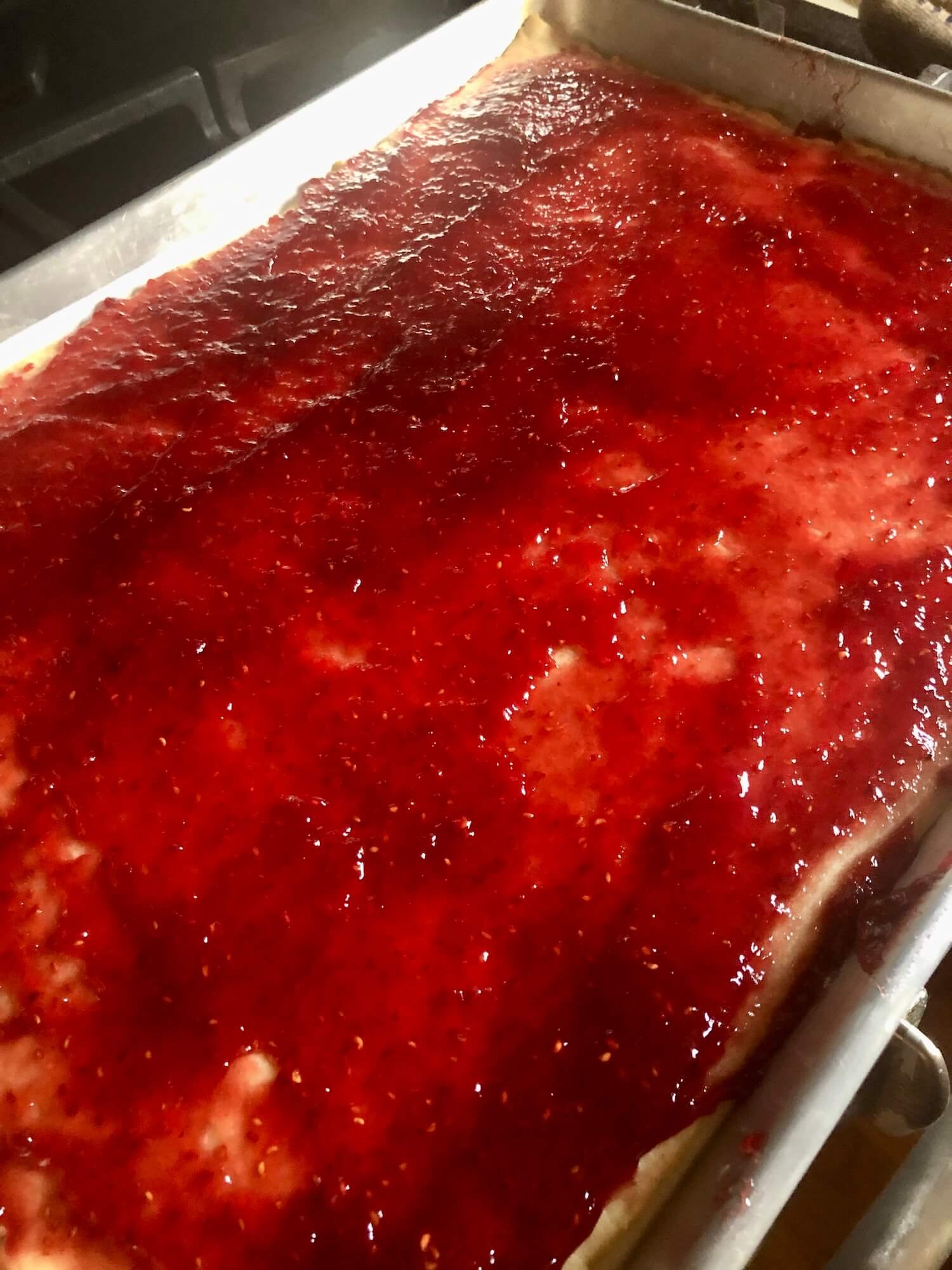 a thin even layer of jam