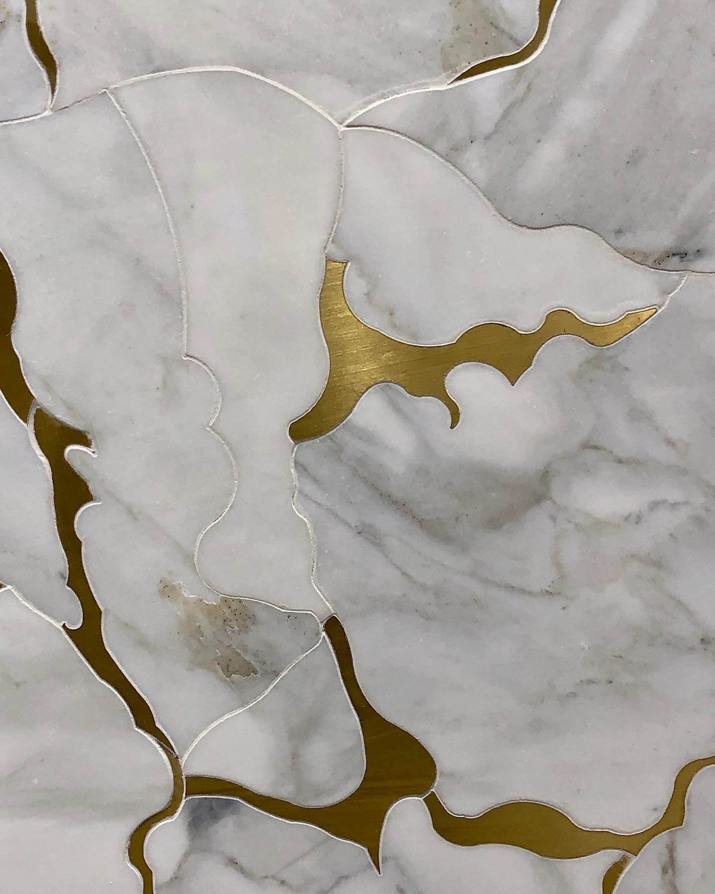 marble and brass mosaic tile