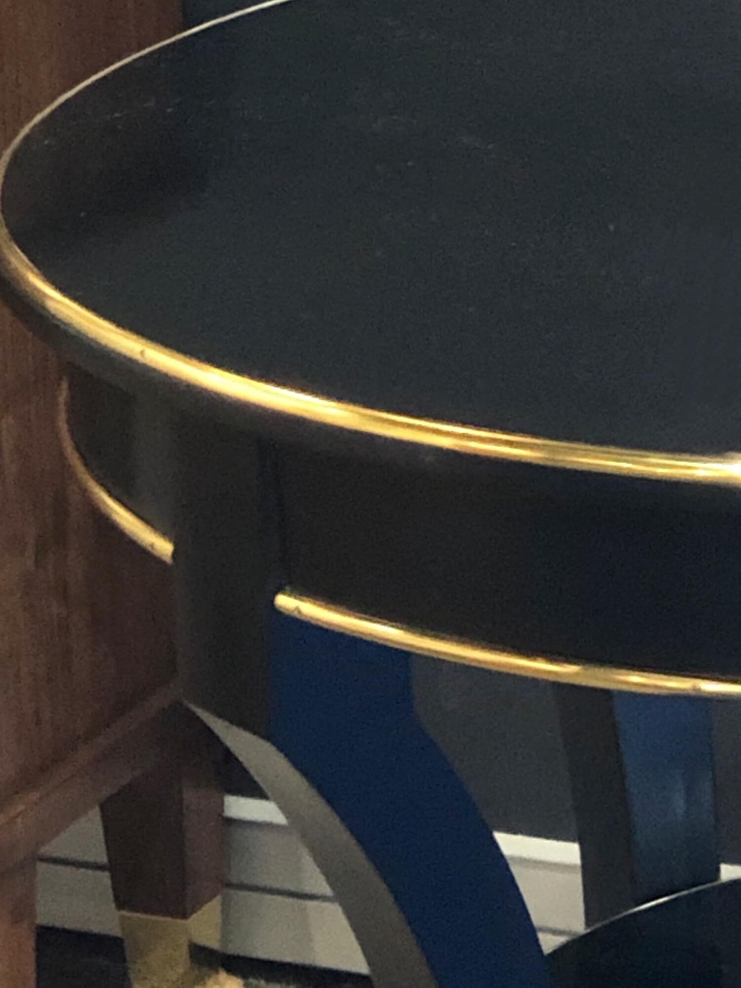 gilded edge on a black table