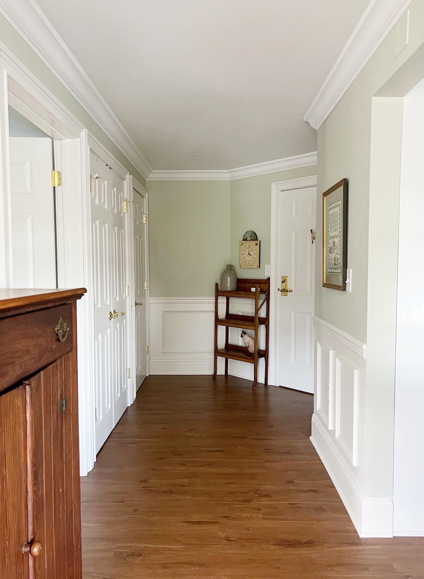 Liveable Green and Alabaster foyer 