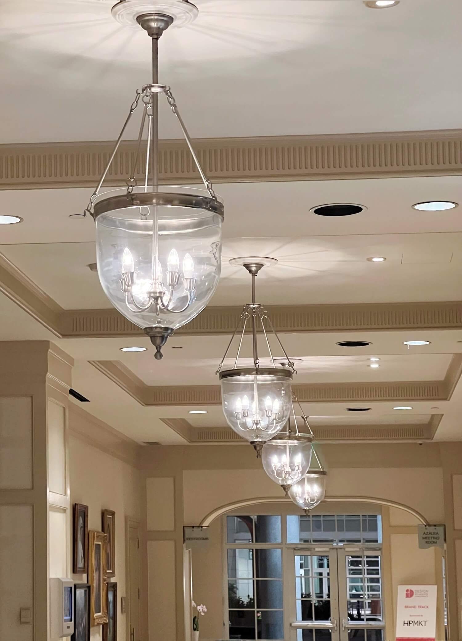 bell jar pendants in the lobby hall