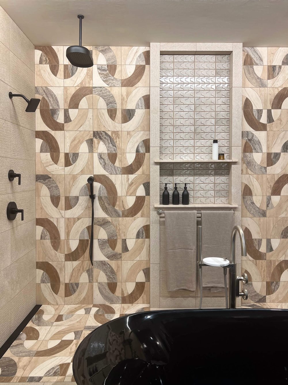 carved subway tile in a bath display