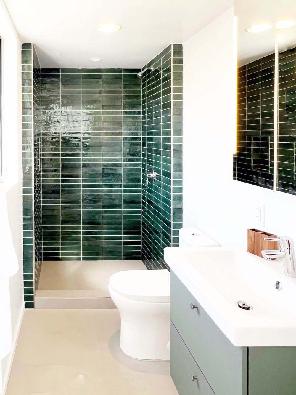 stacked subway tile in a tiny home bath