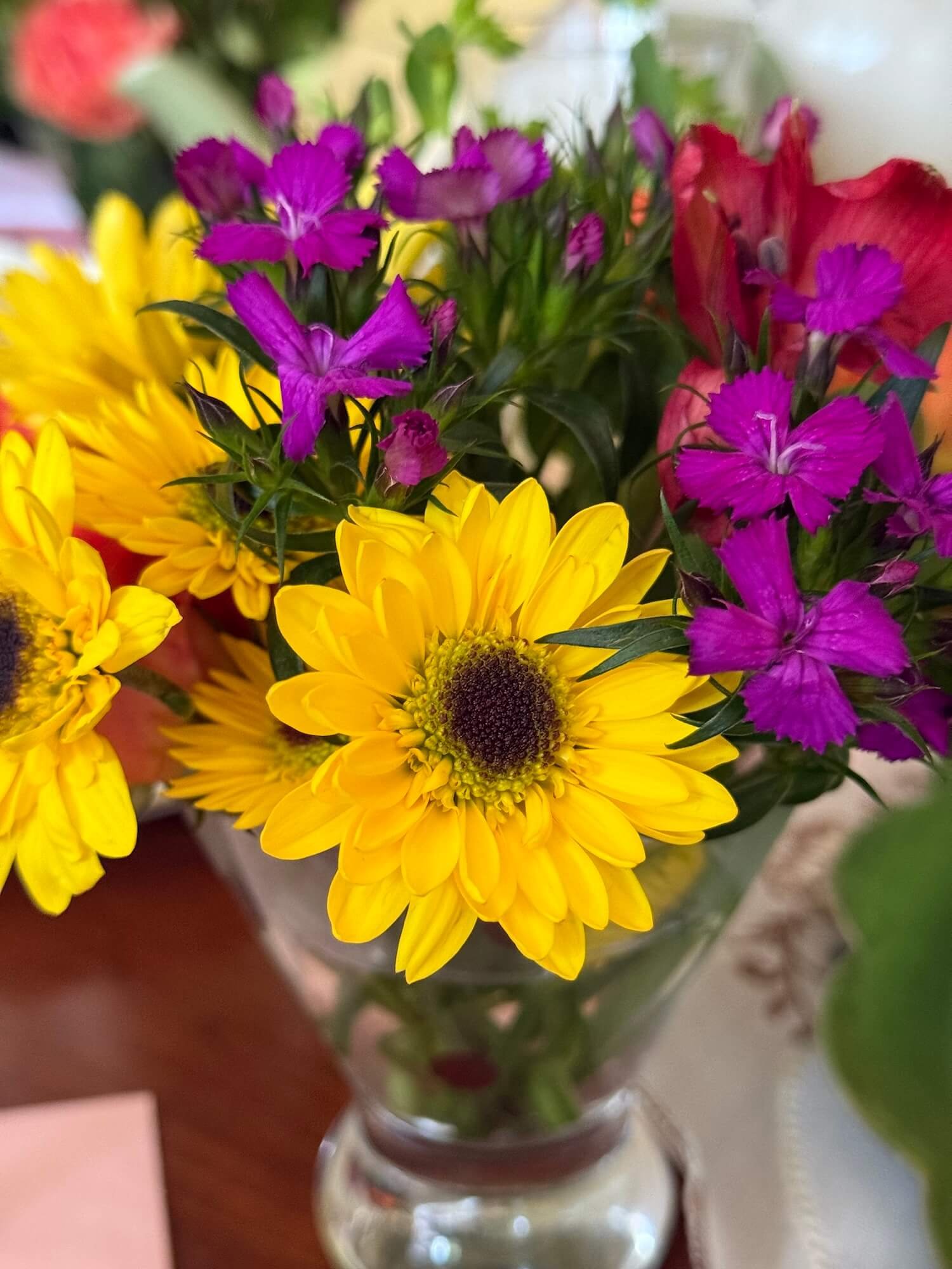 mini bouquet with yellow and purple.jpeg