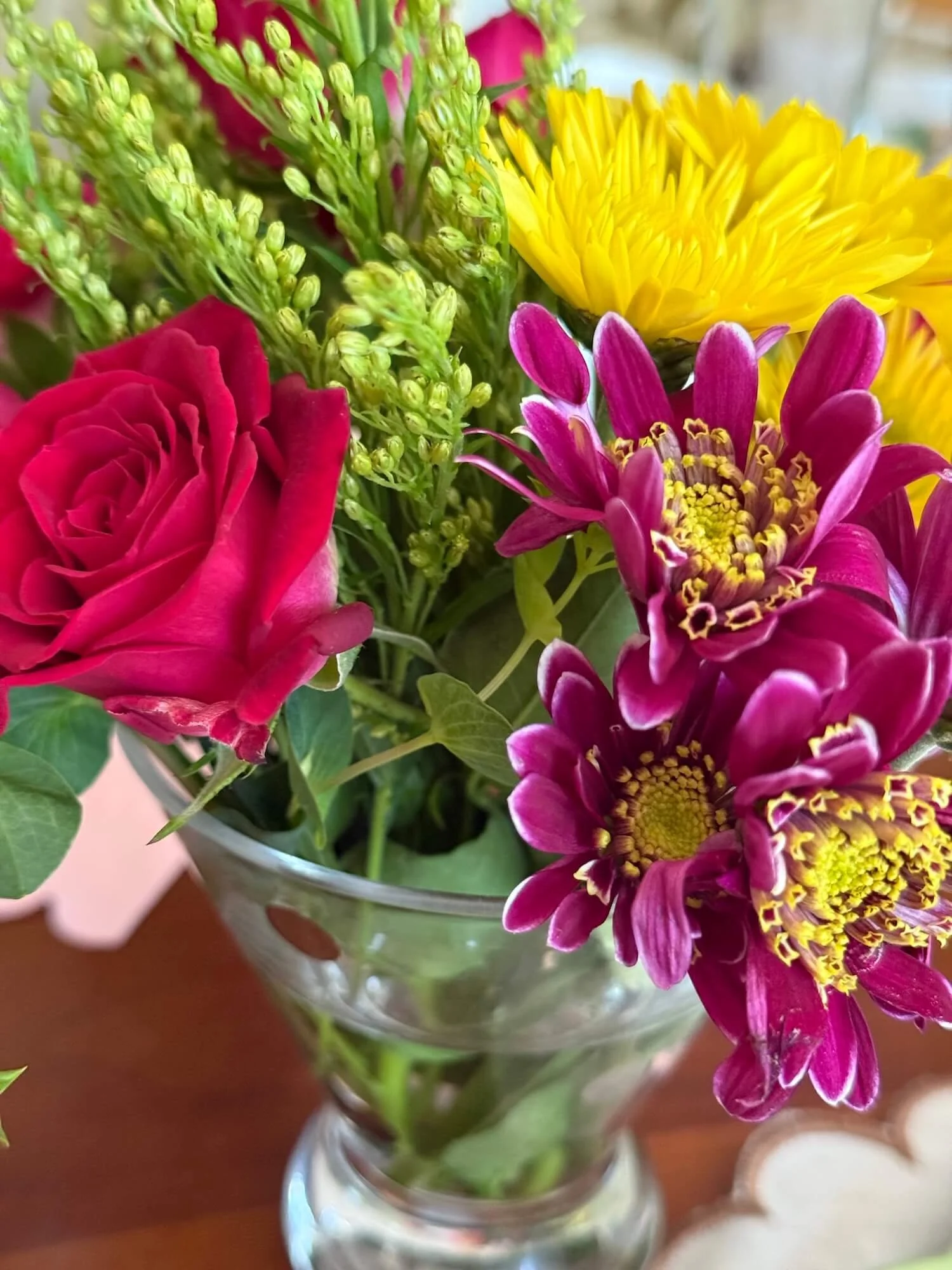 minibouquet with pink and yellow and purple.jpeg