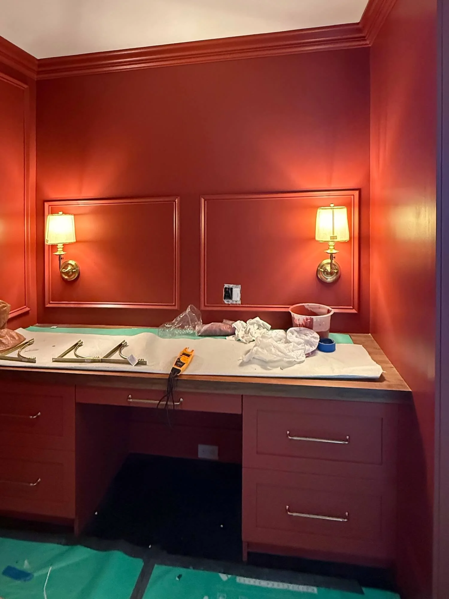 desk in red painted library in progress.jpeg