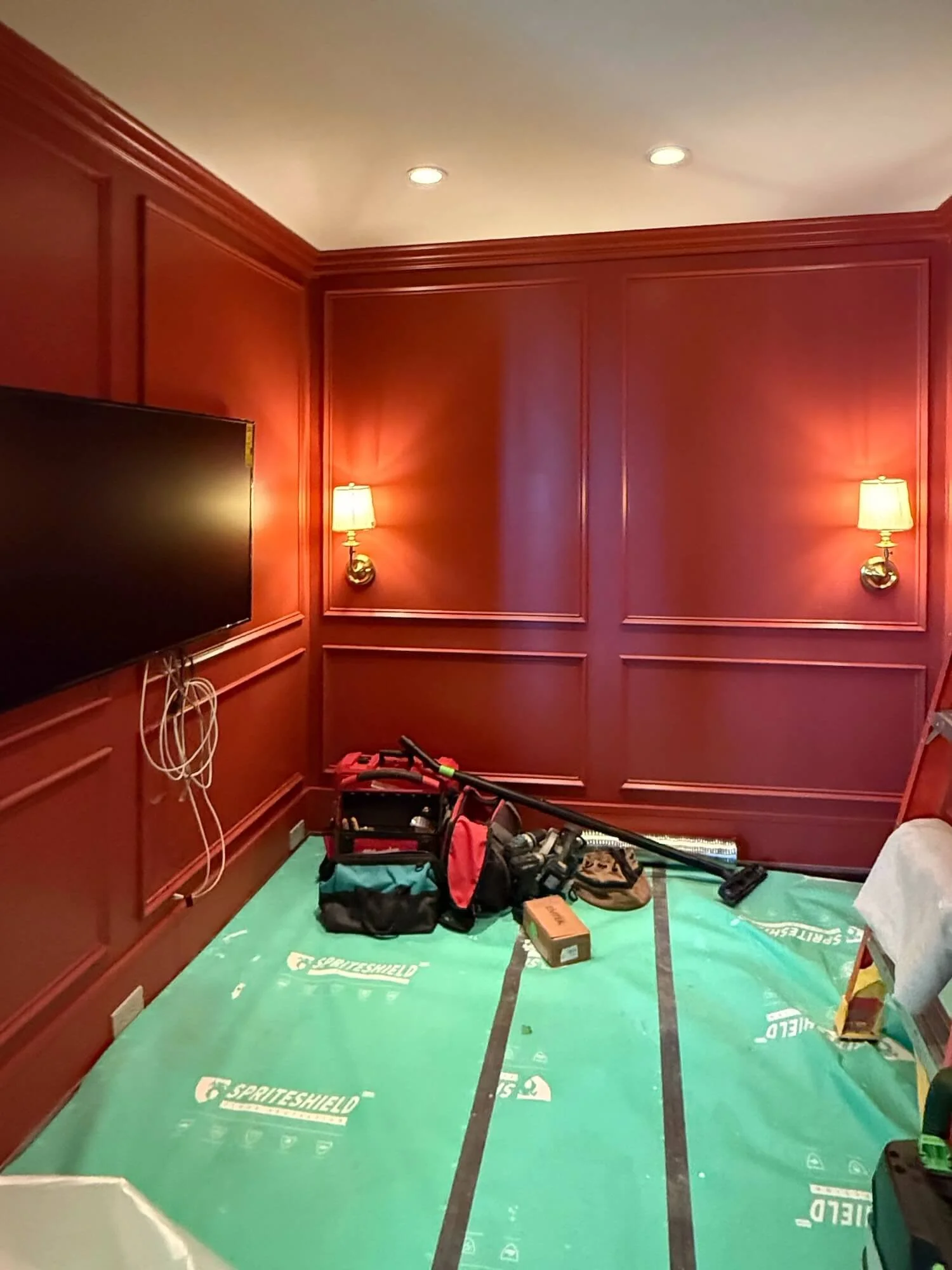 red painted library in progress.jpeg