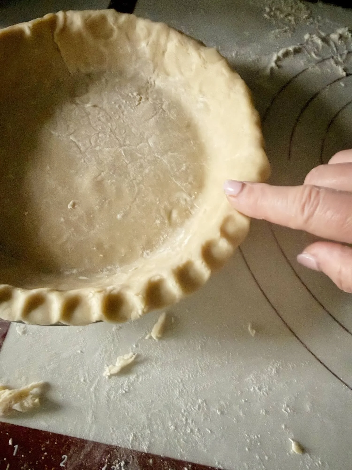 fluting the piecrust edges.jpeg