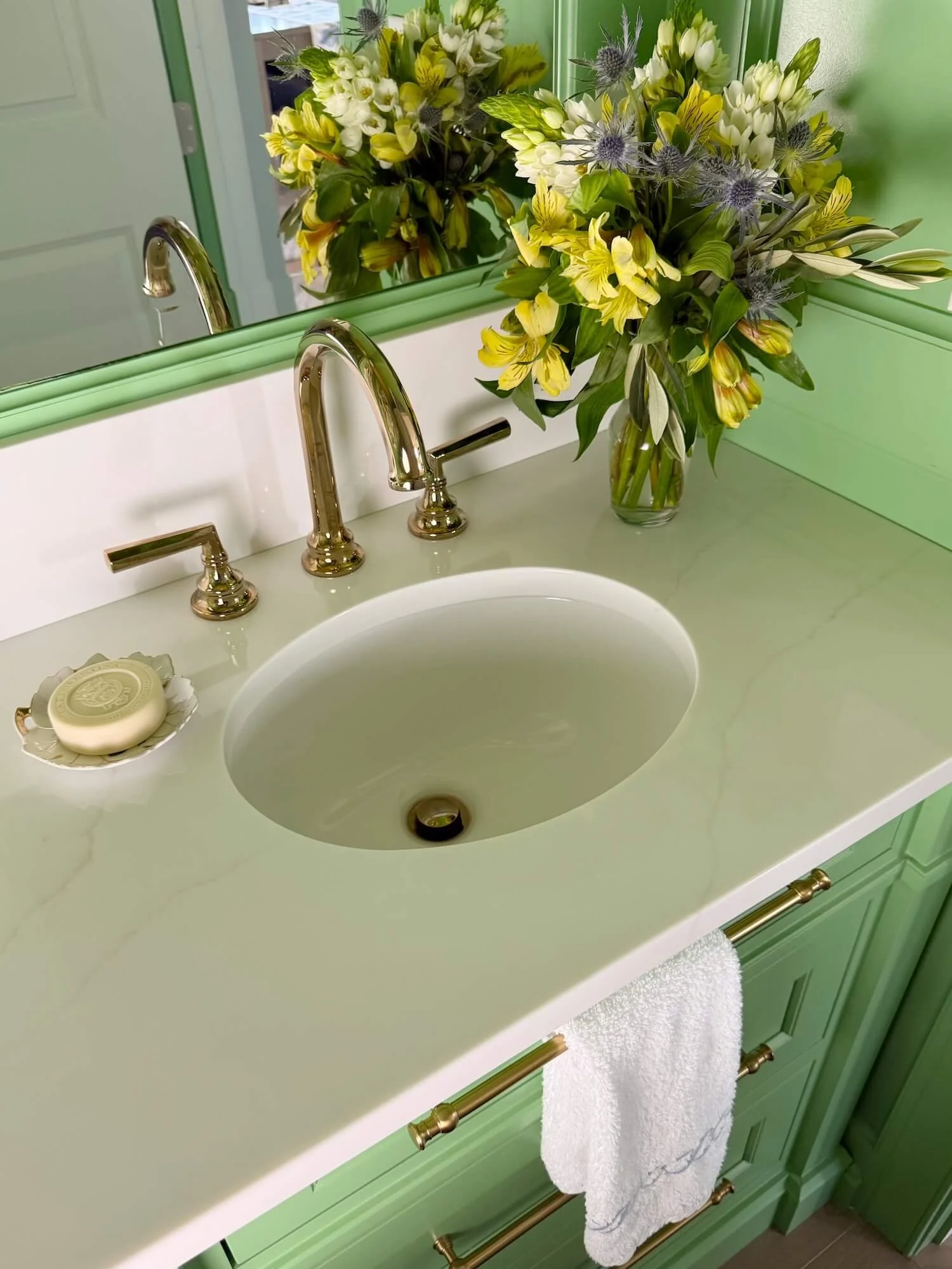 powder room stone counter and backsplash.jpeg