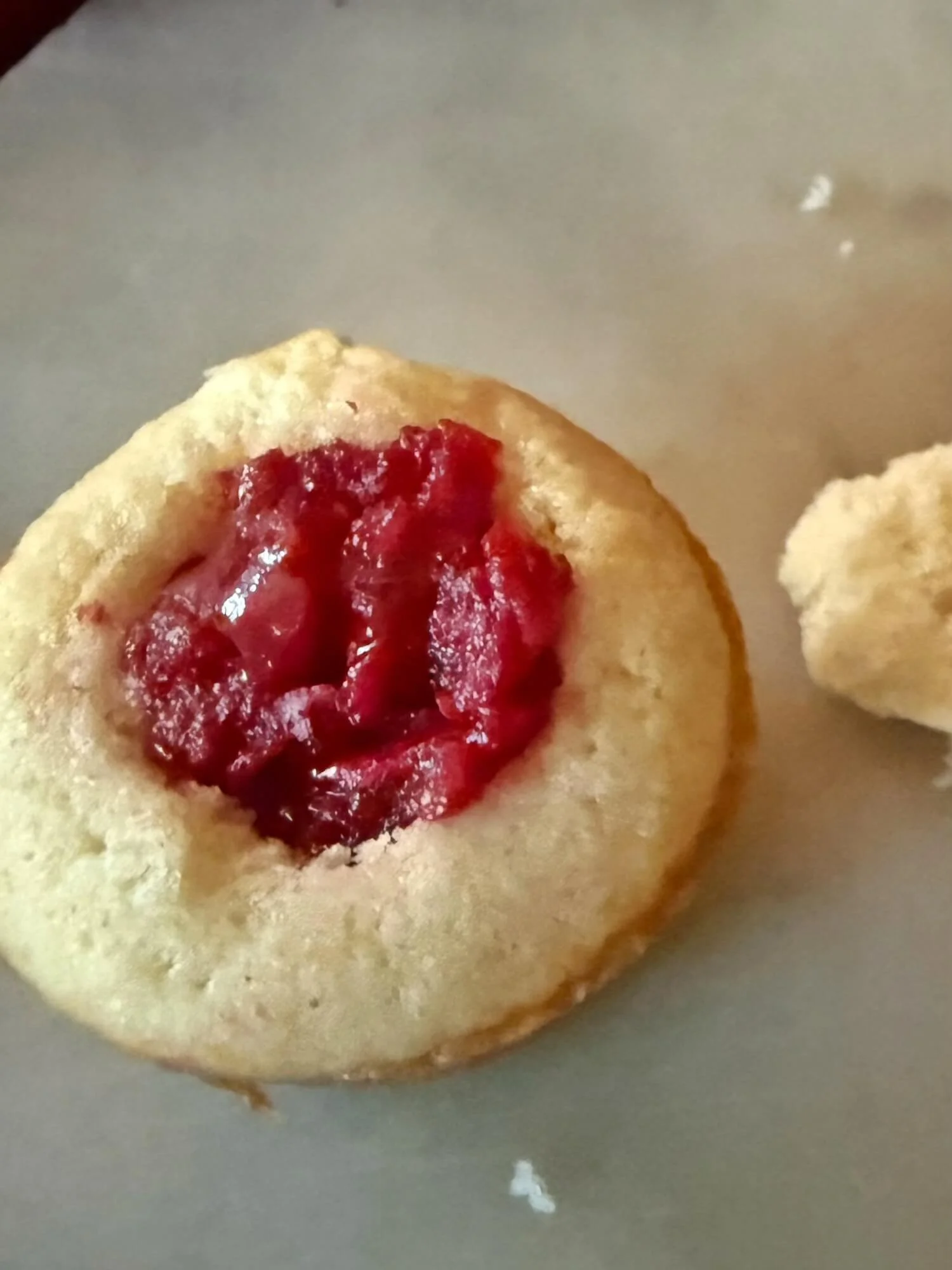 filling the cupcakes with raspberry