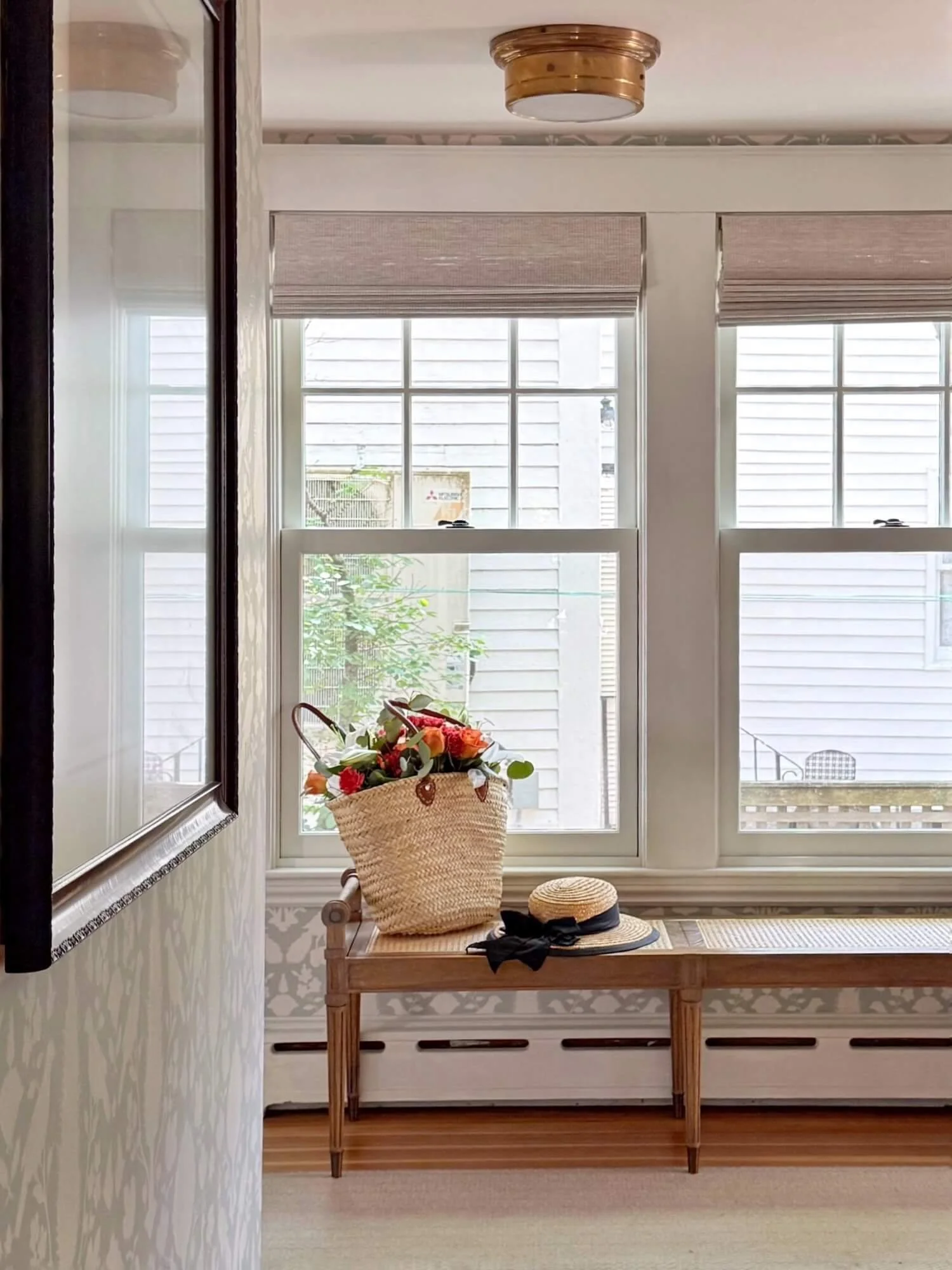 entry hall windows and bench.jpeg