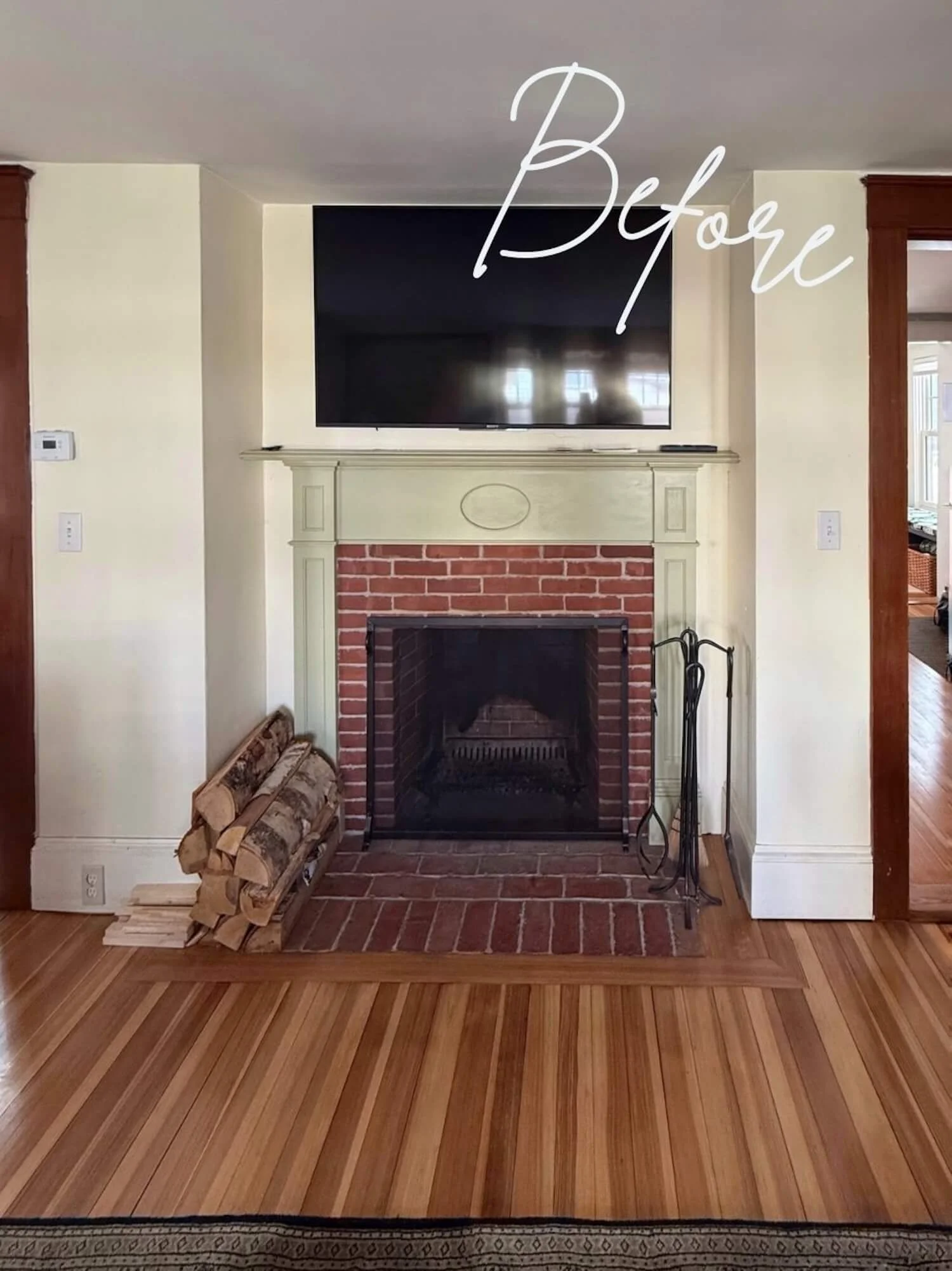 living room fireplace BEFORE.jpg