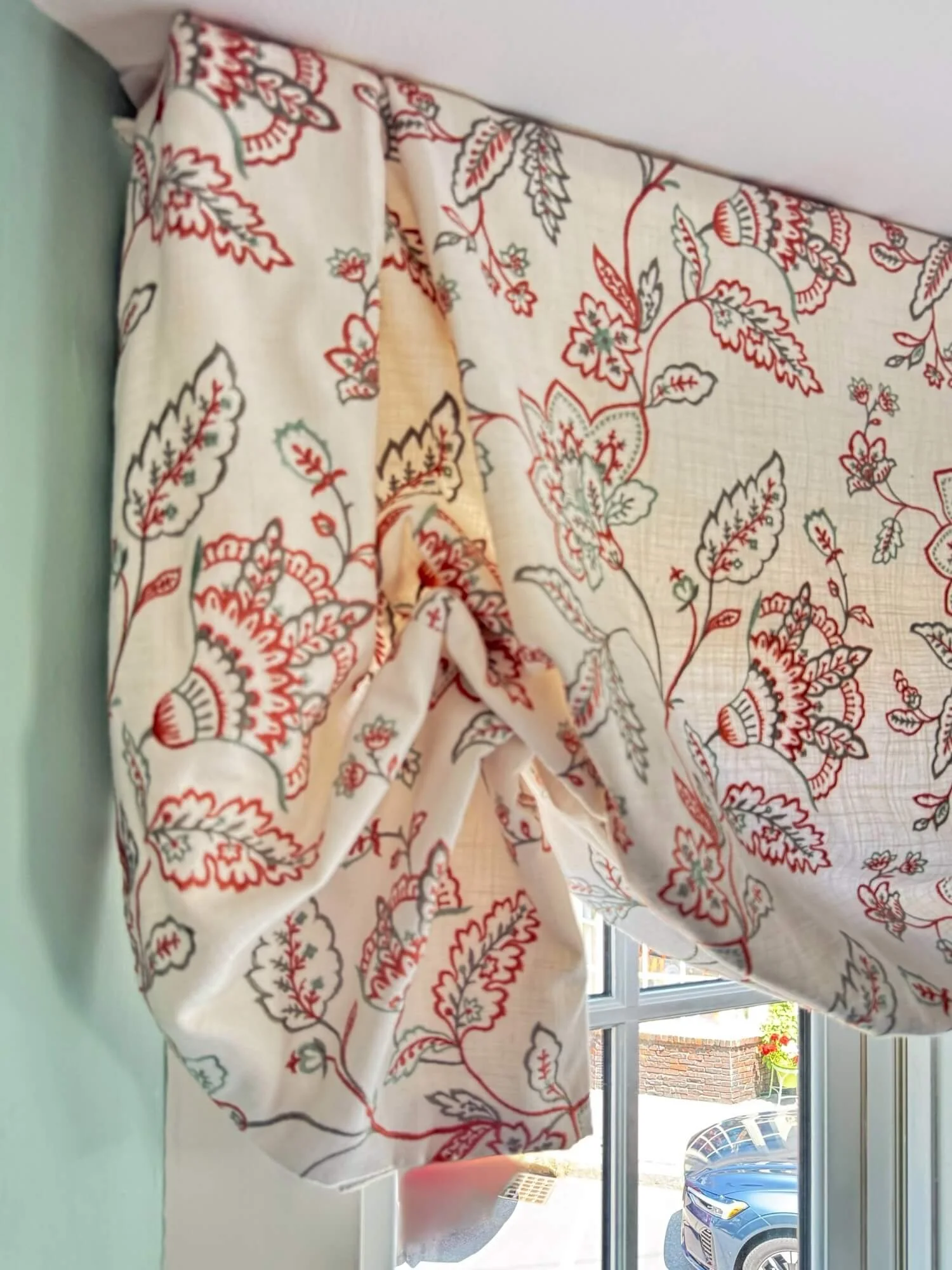 living room window treatment closeup.jpeg