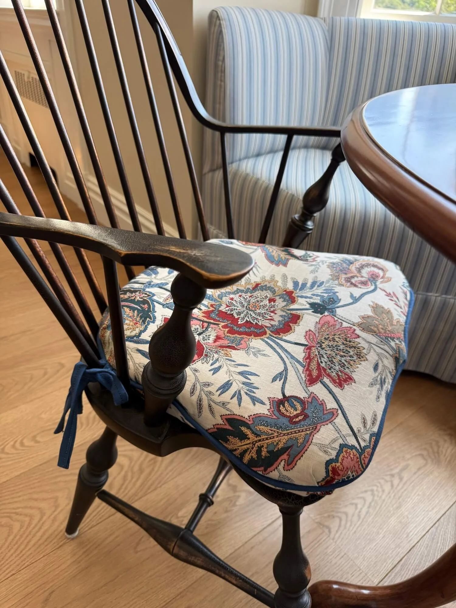 grreat room windsor chairs with custom pads.jpeg