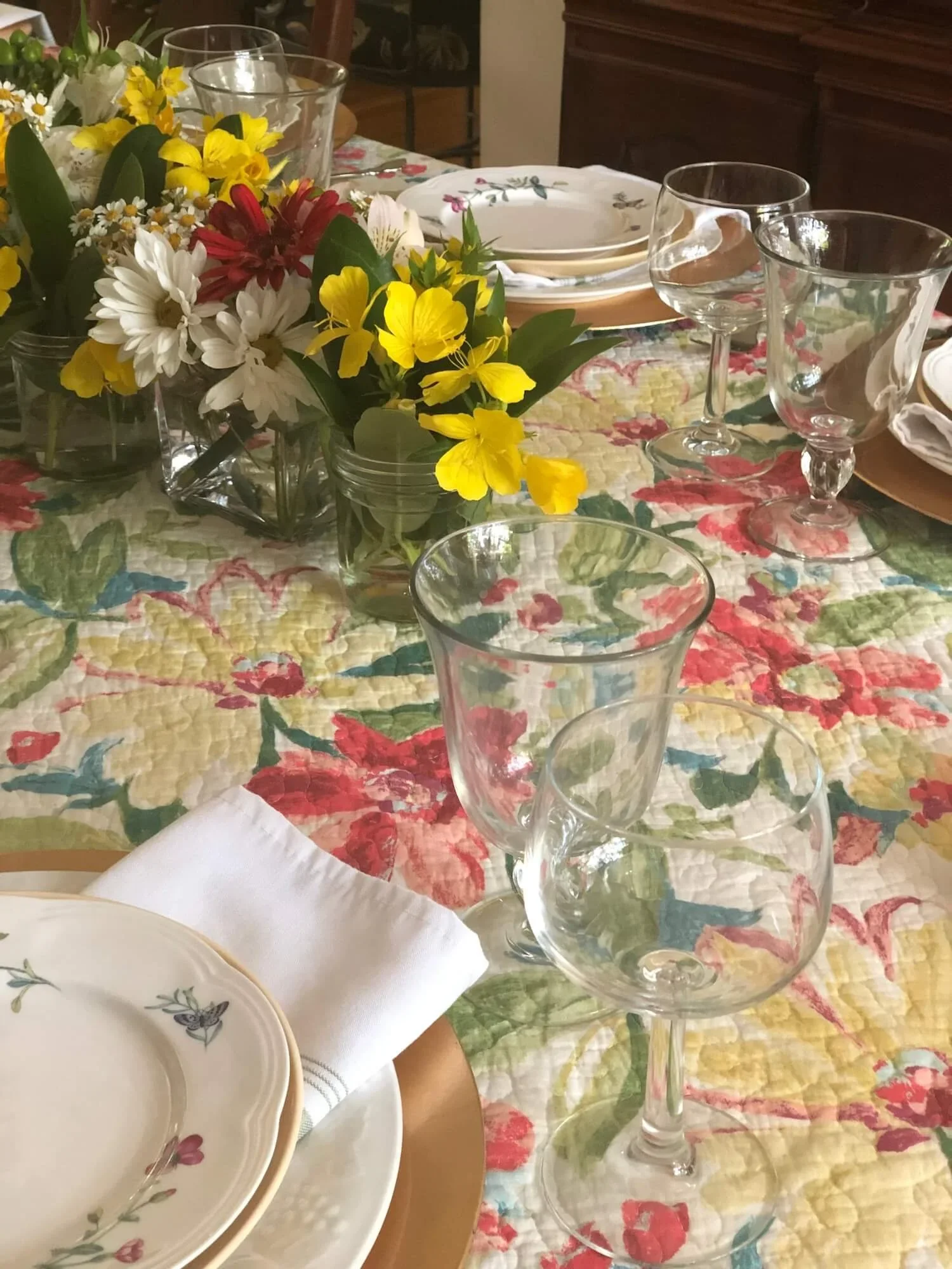 colorful matelasse coverlet as tablecloth