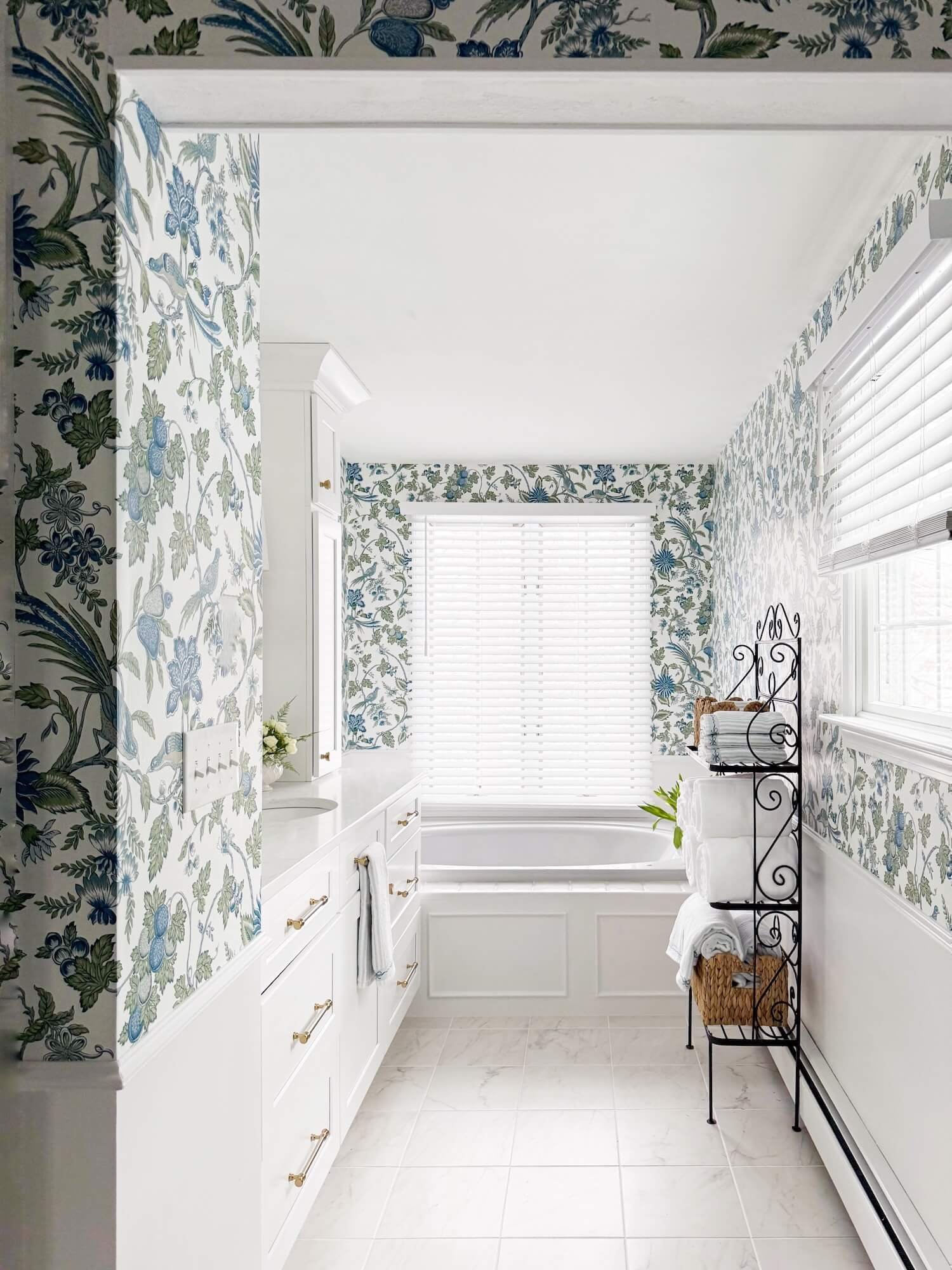 fresh traditional white bathroom with wallpaper