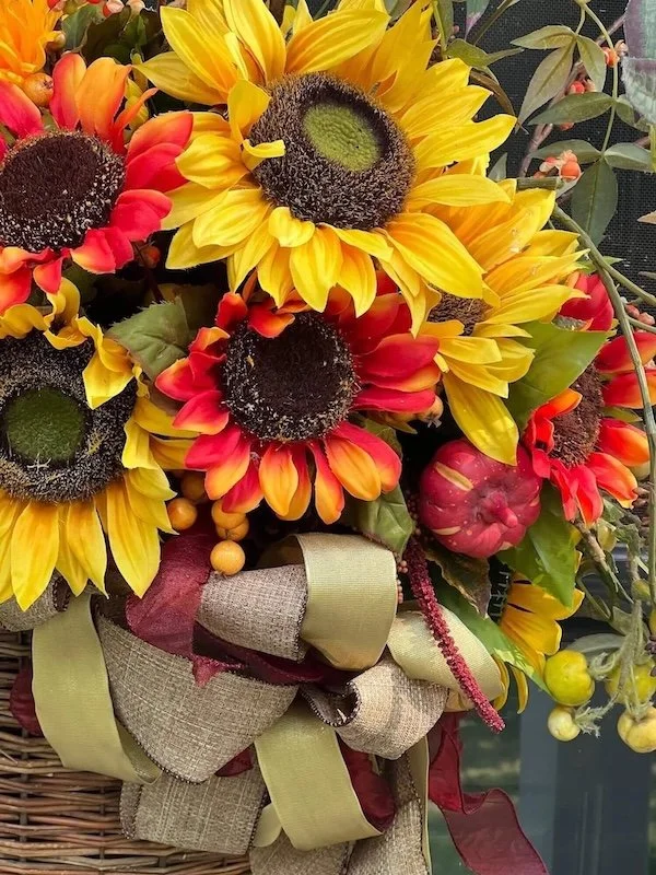 fall entry door basket with sunflowers