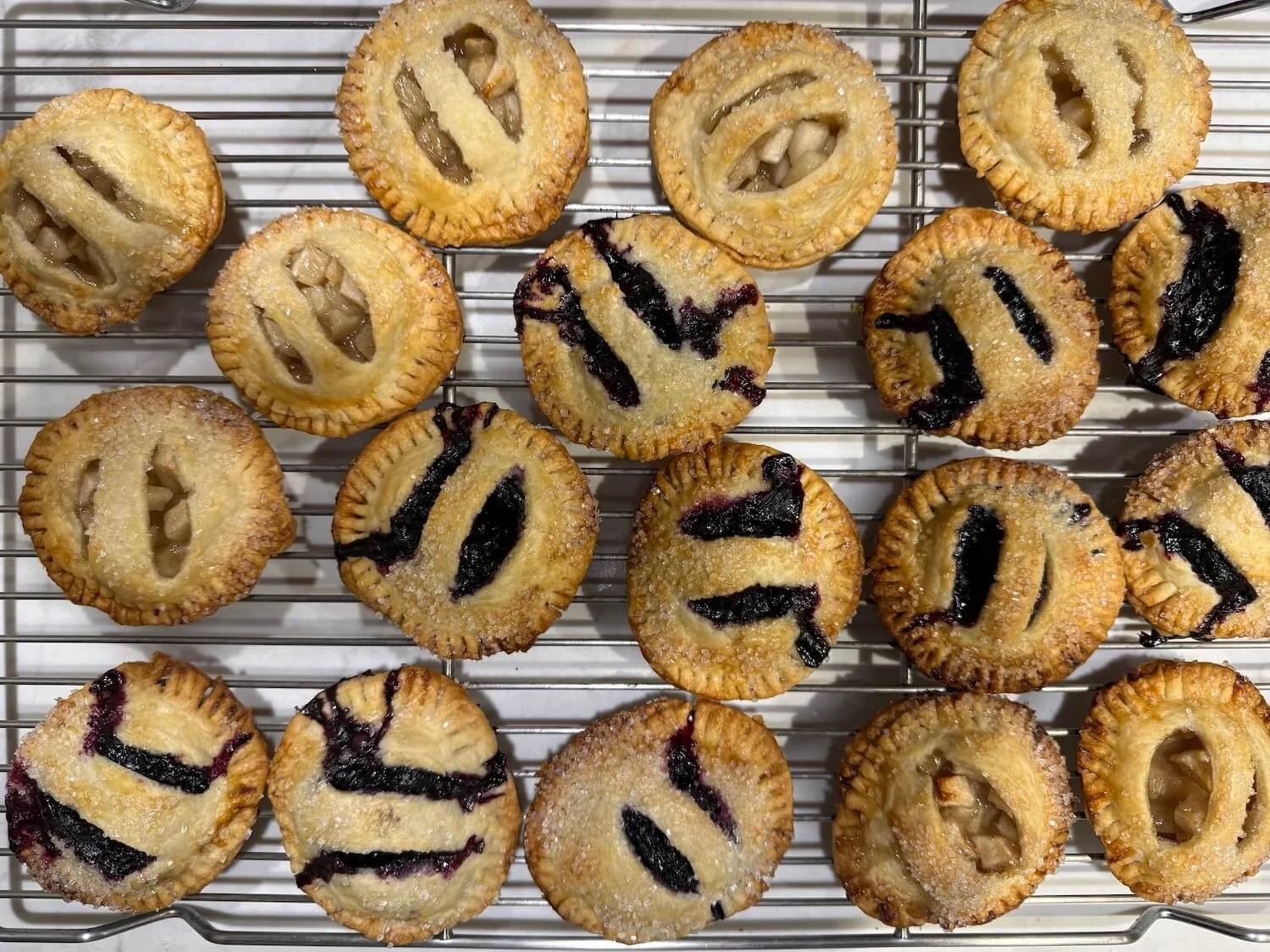 apple and blueberry hand pies cooling