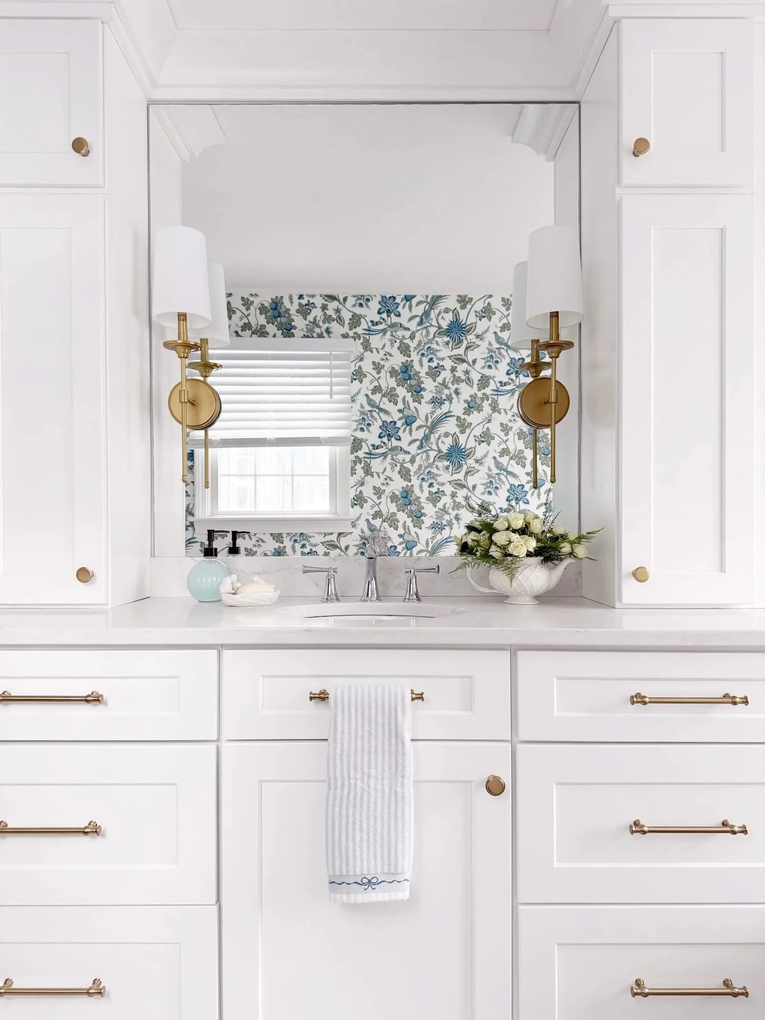 white bathroom vanity with tower cabinets