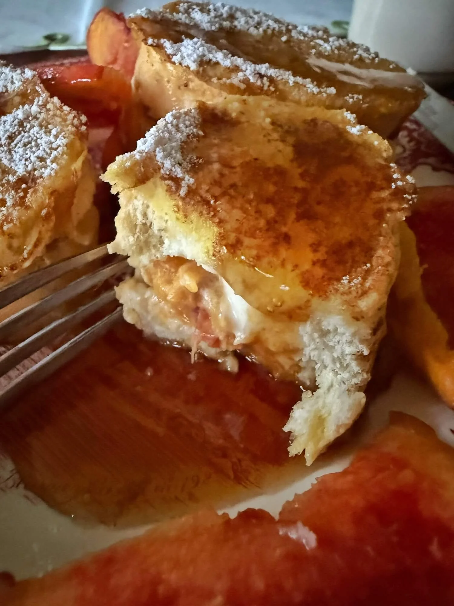 peach stuffed french toast with maple syrup