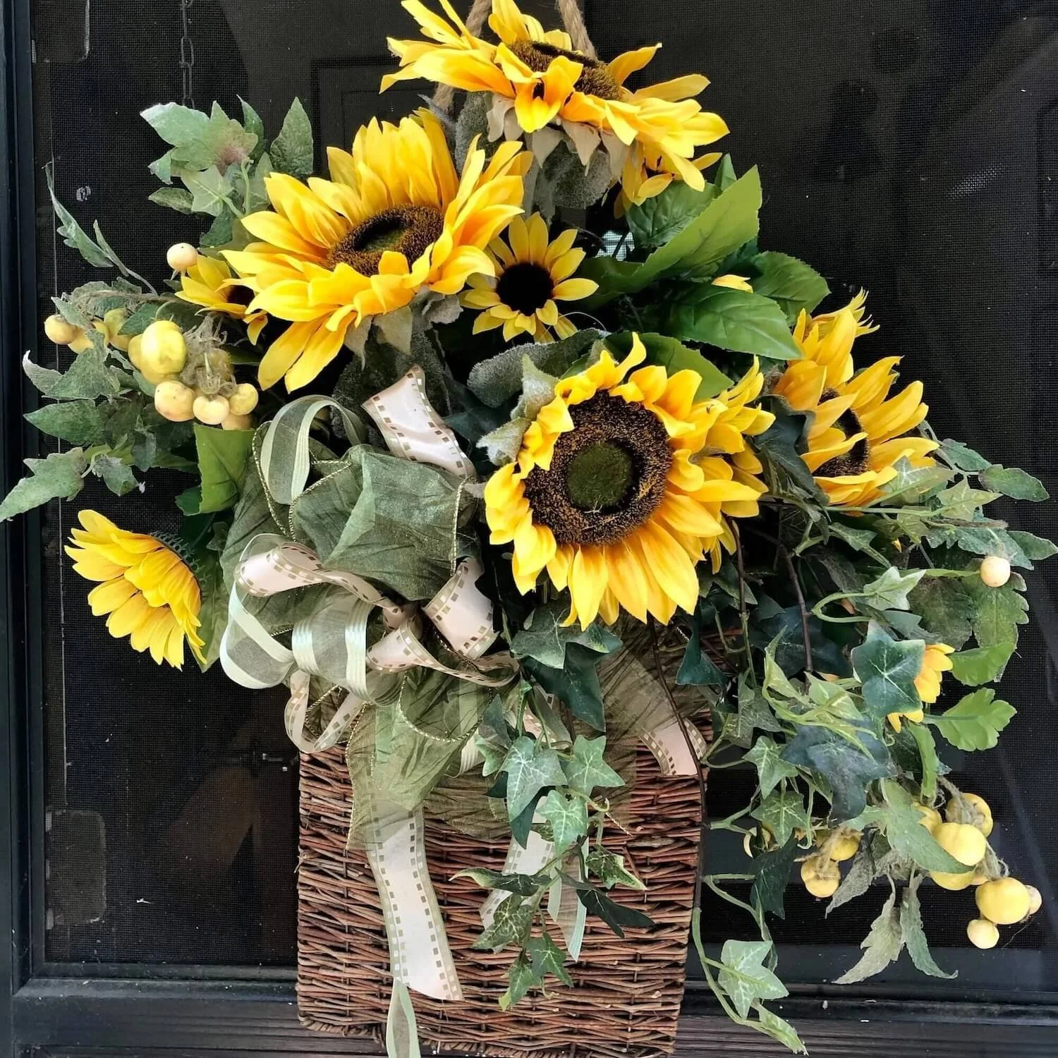 autumn door basket with yellow  sunflowers