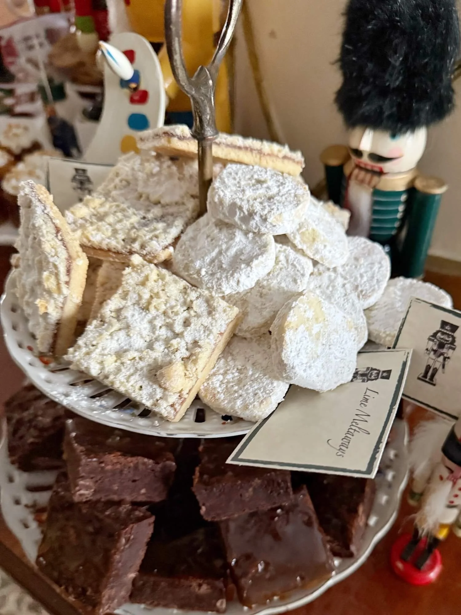 raspberry squares, lime meltaways, sea salt caramel brownies on a two tier stand