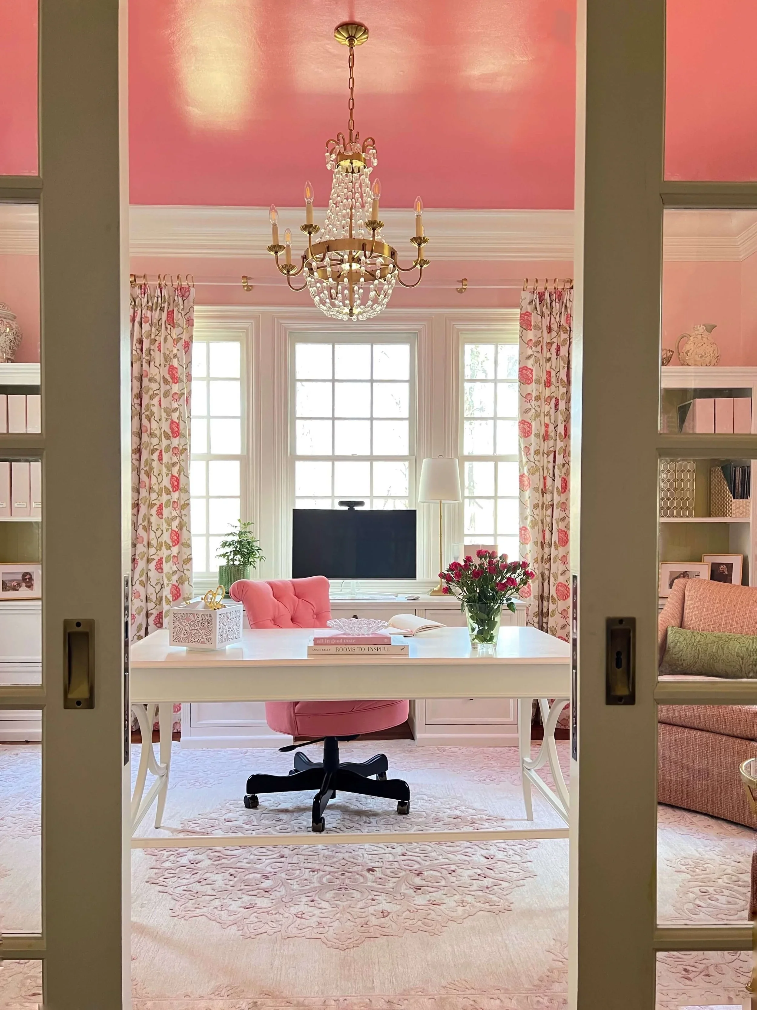 pink home office with white trim