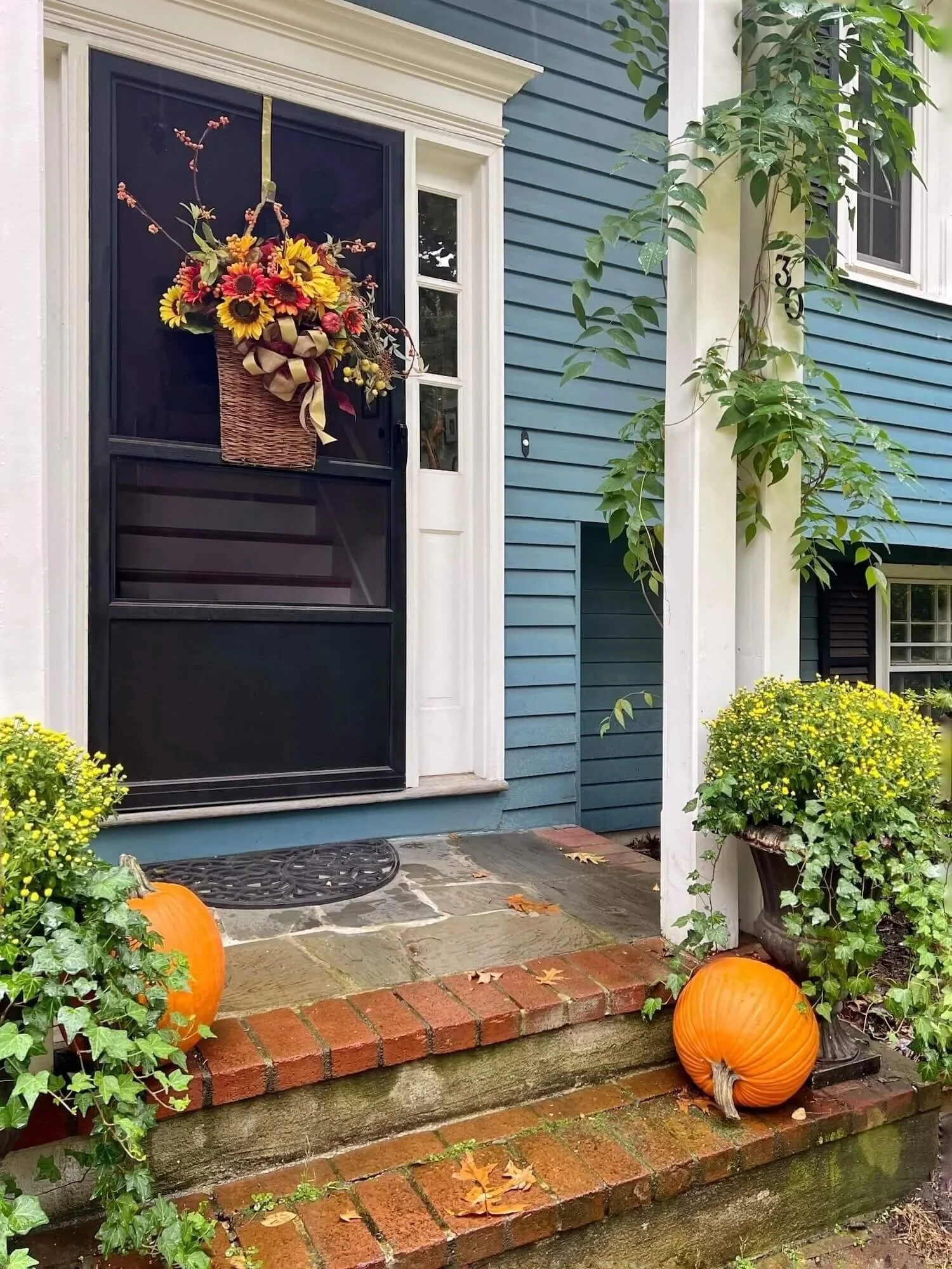 front entry with fall decor
