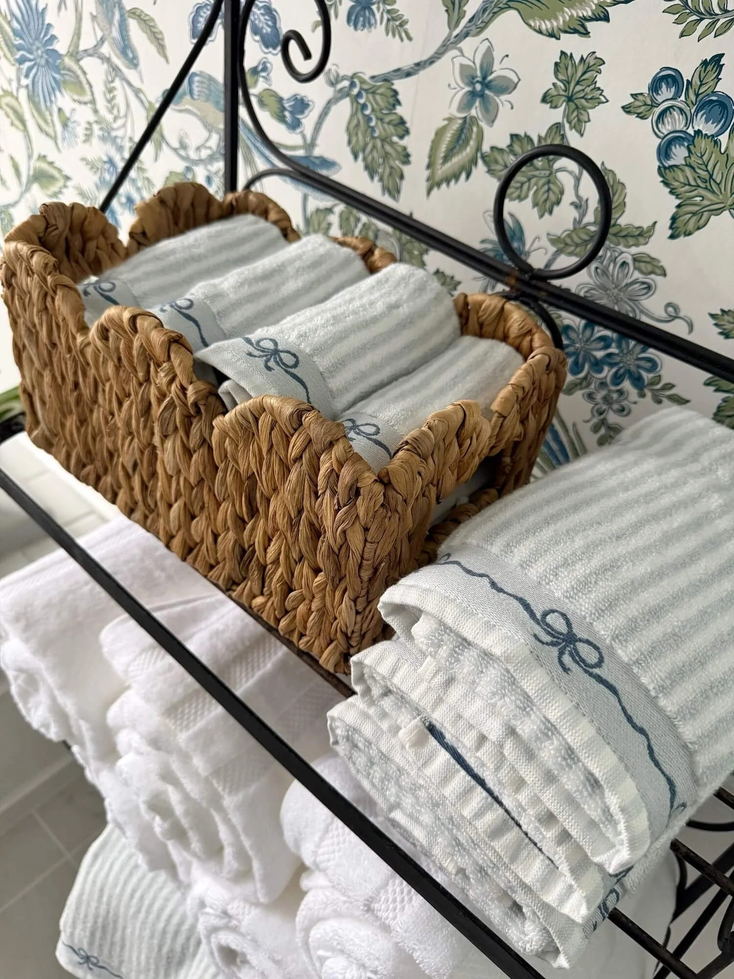 striped towels with embroidered bow edging