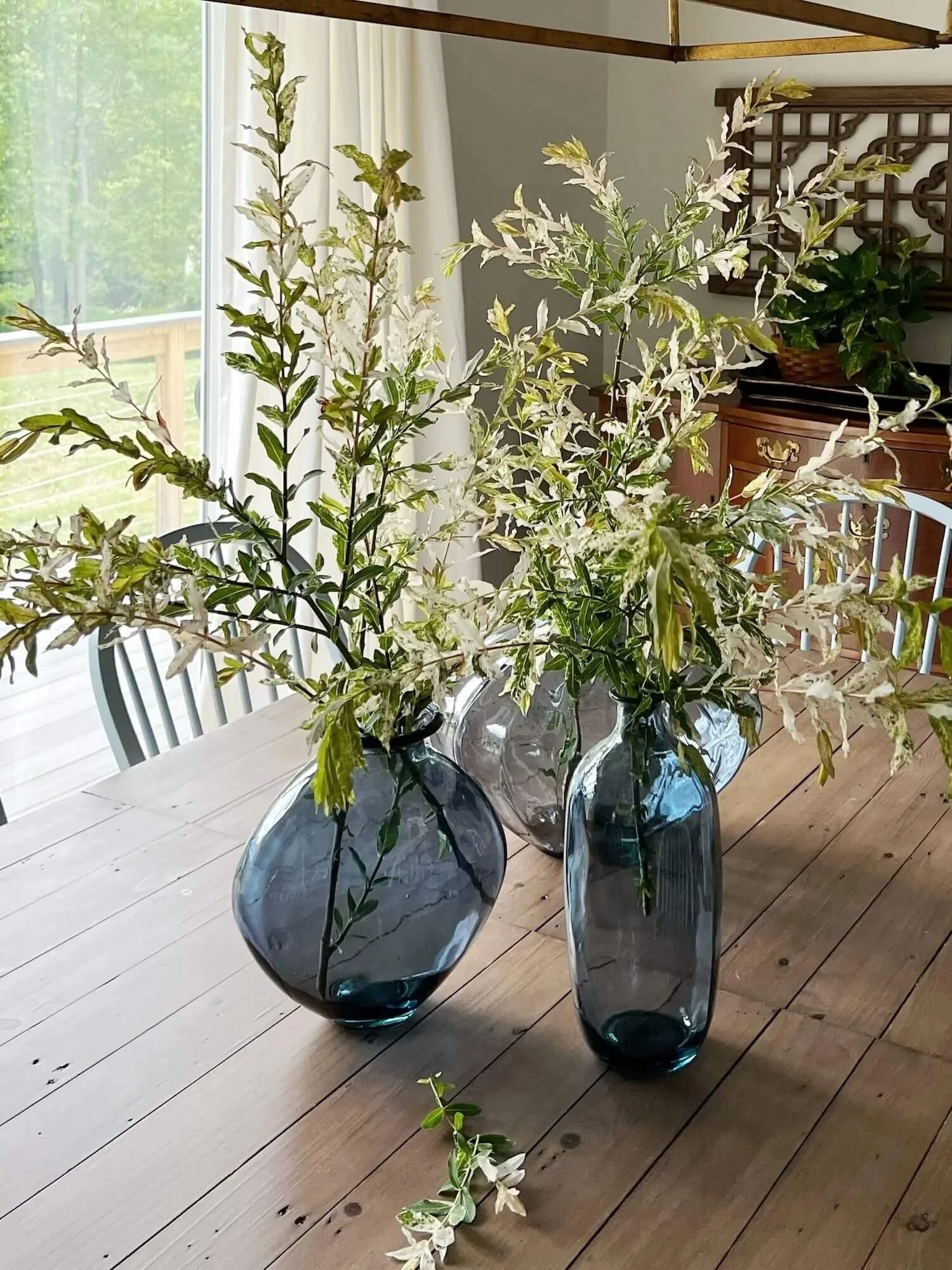 branches in bottles for the dining table
