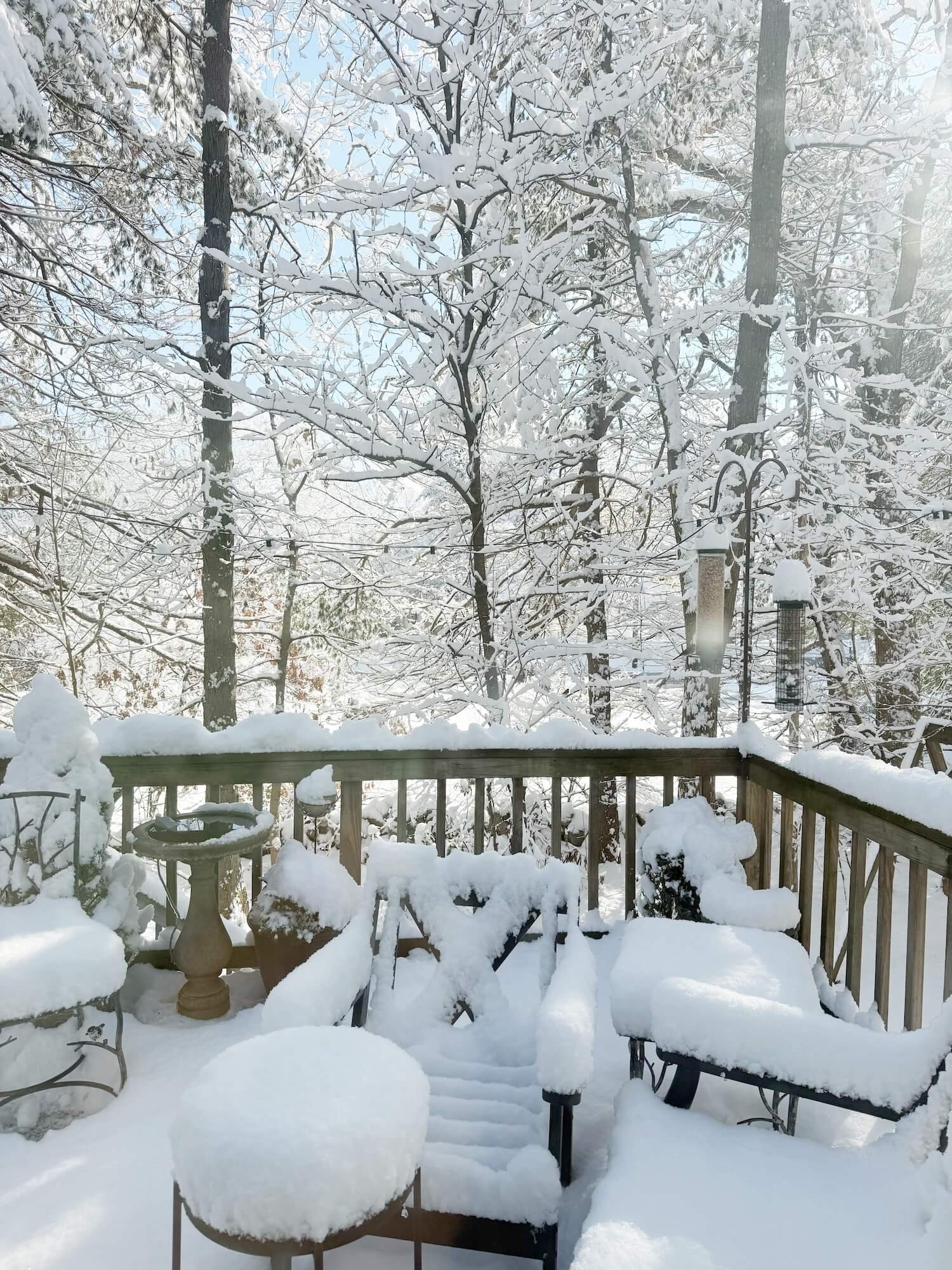 snow covered deck furniture