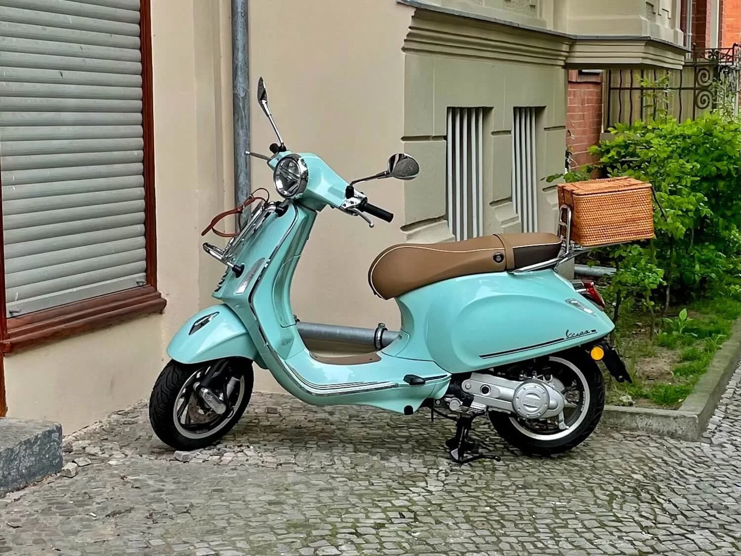 moped parked on the sidewalk in Berlin