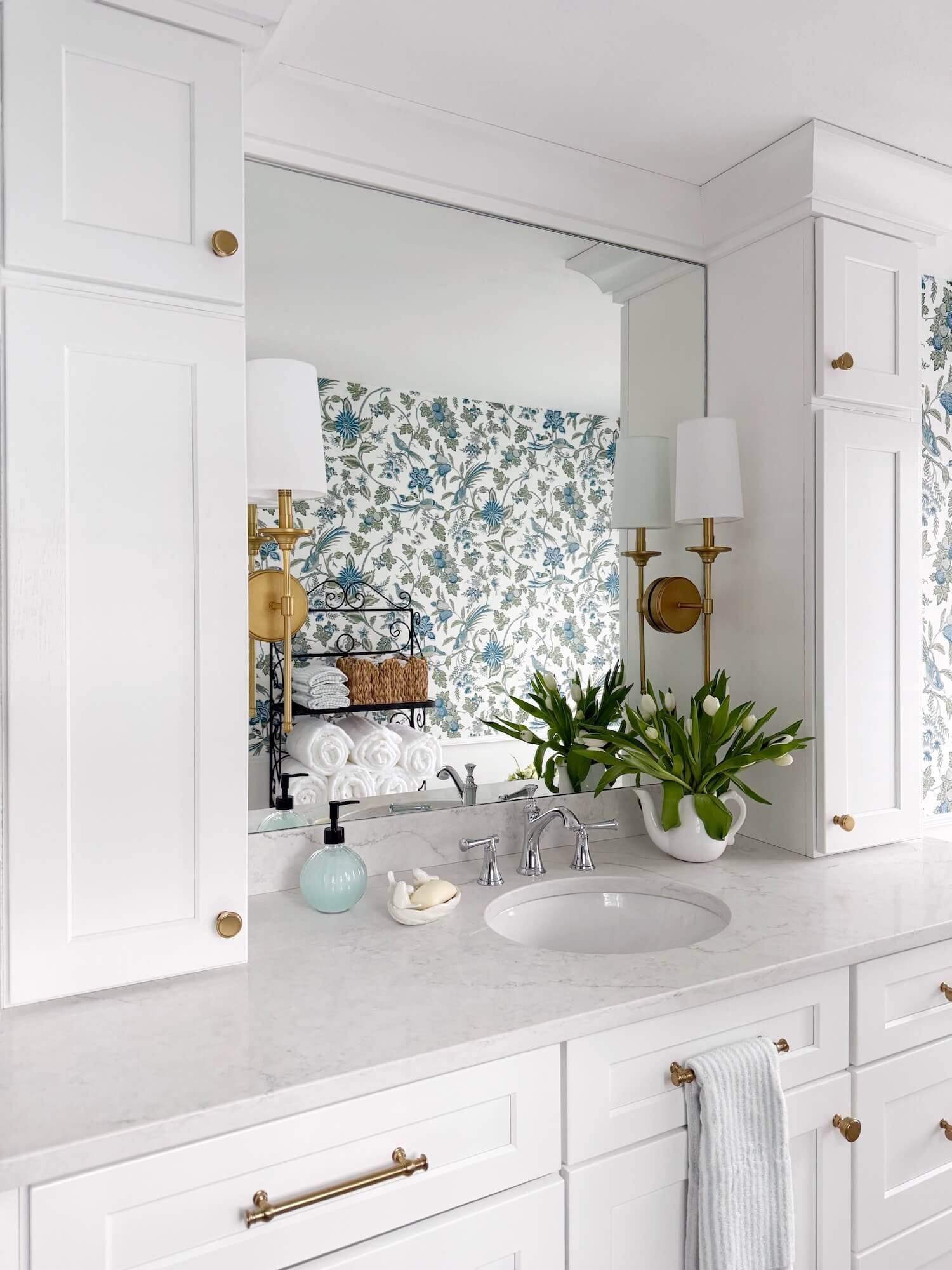 vanity with reflected wallpaper