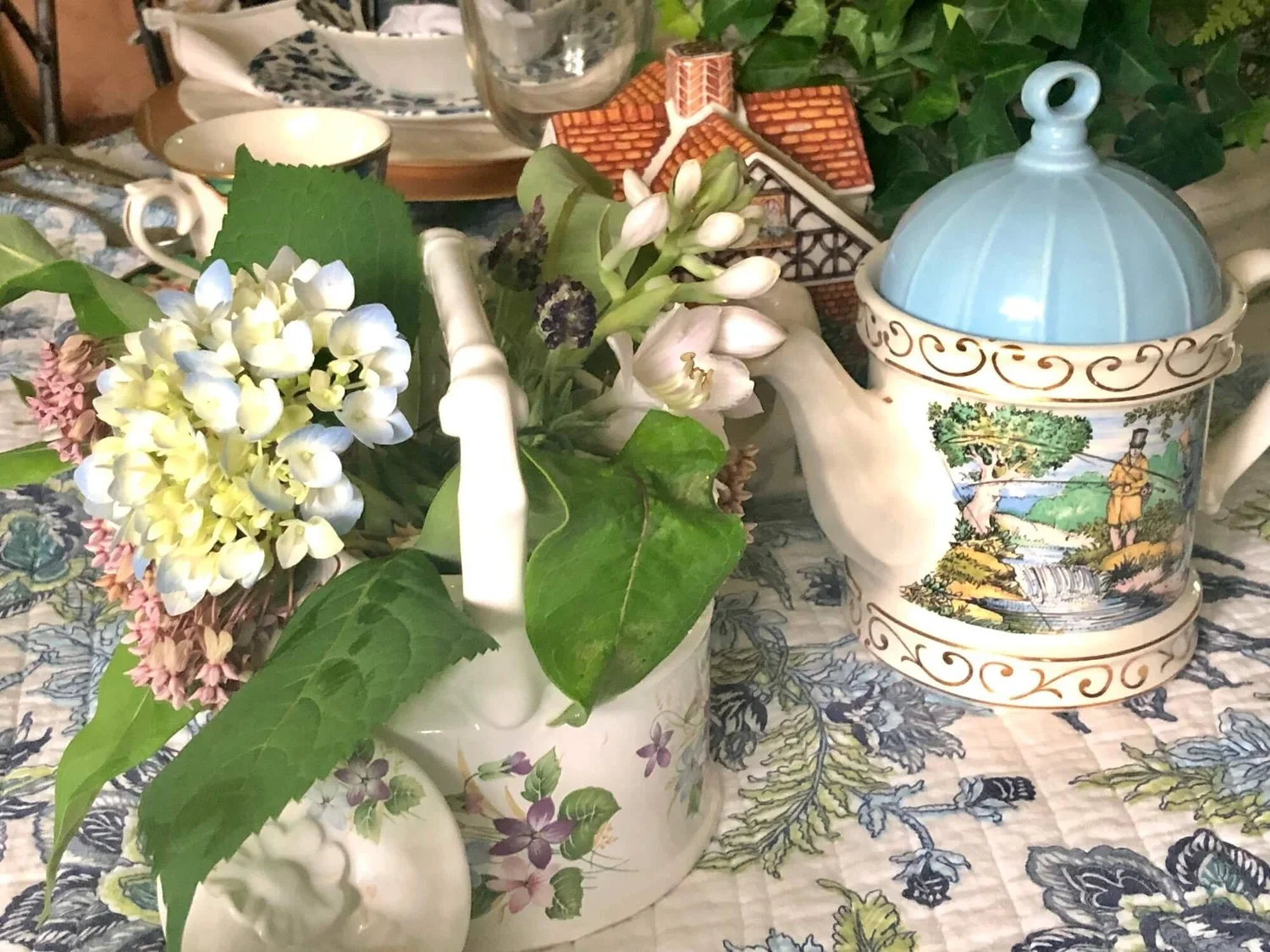 teapots and flowers as centerpiece items