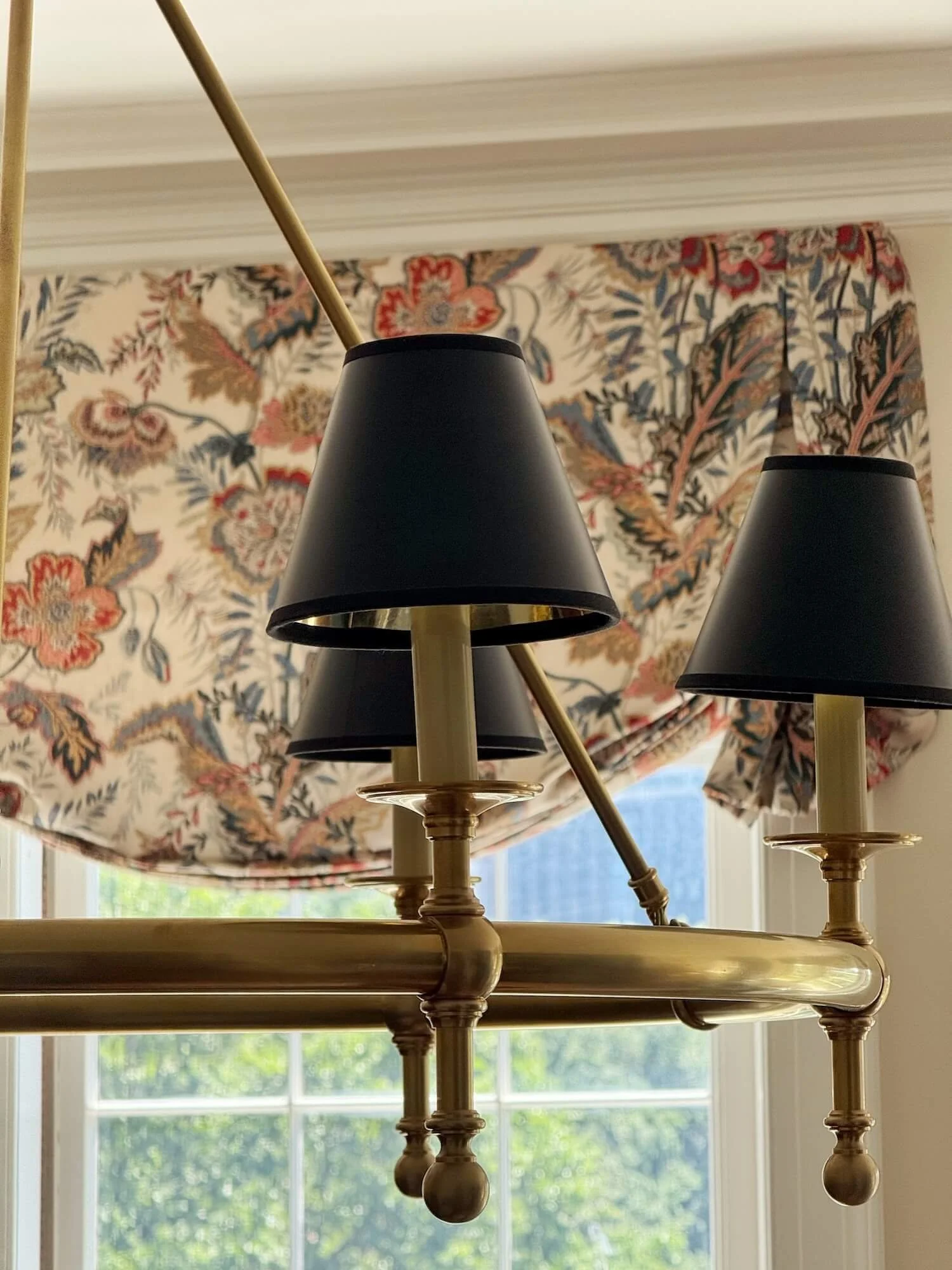 great room bookcase area chandelier close up.jpeg