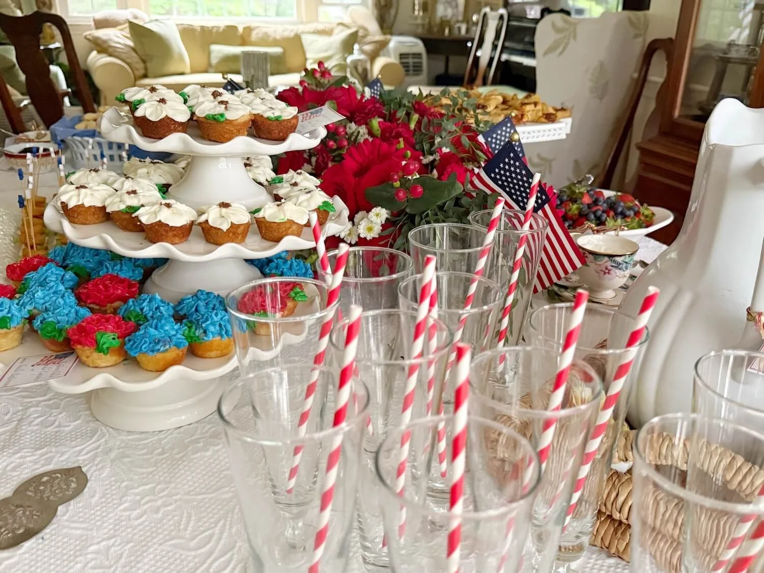 table set for afternoon tea with iced tea glasses and treats