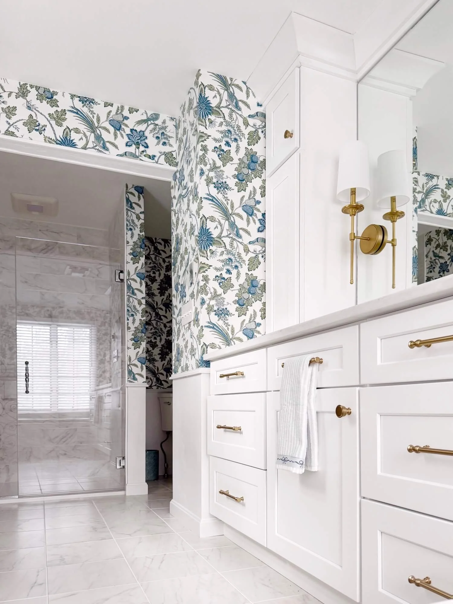 white traditional bathroom with wallpaper