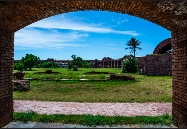 Per the National Park Service website: Almost 70 miles (113 km) west of Key West lies the remote Dry Tortugas National Park. The 100-square mile park is mostly open water with seven small islands. Accessible only by boat or seaplane, the park is known the world over as the home of magnificent Fort Jefferson, picturesque blue waters, superlative coral reefs and marine life, and the vast assortment of bird life that frequent the area.