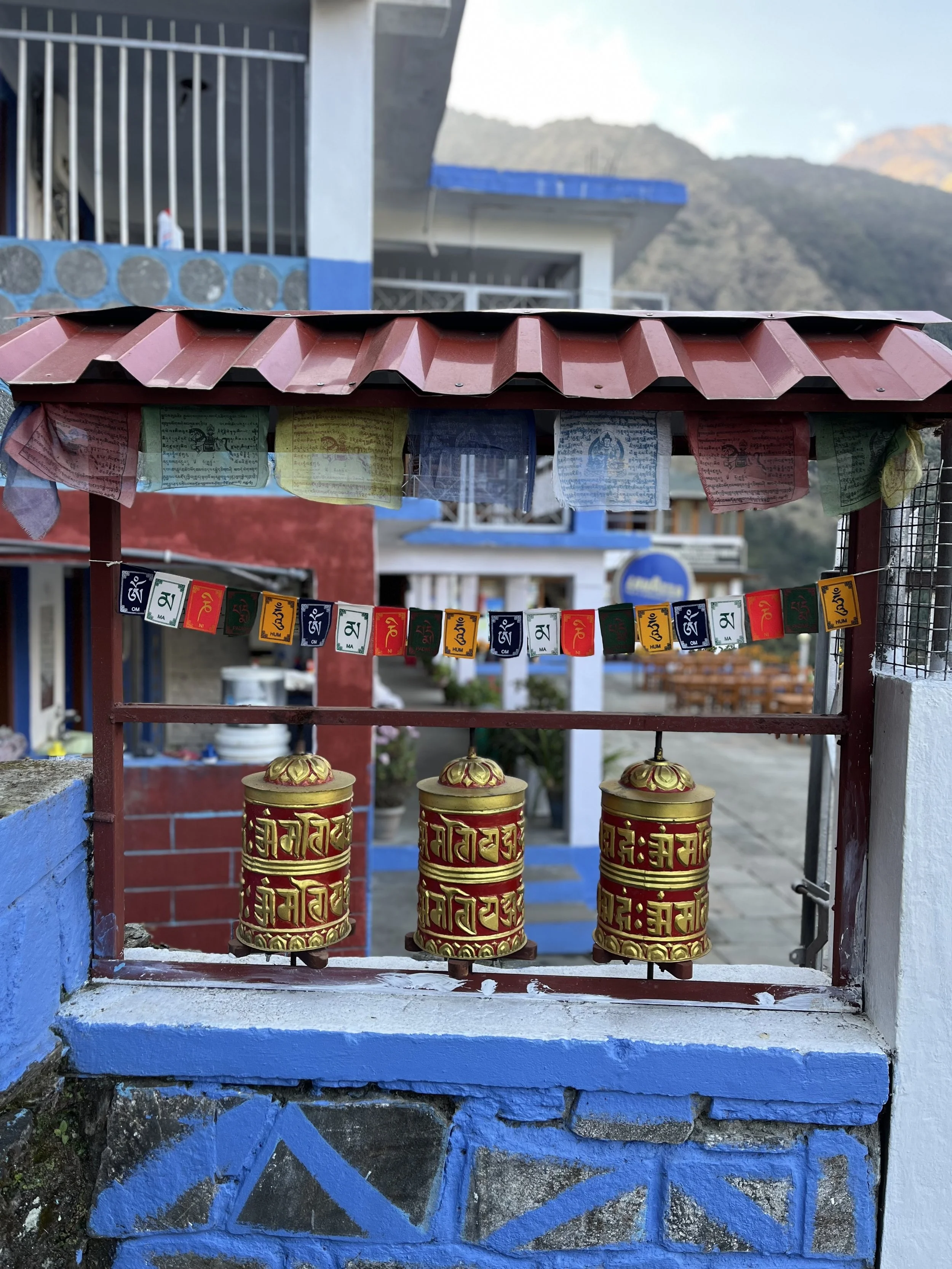 prayer wheels annapurna base camp trek.jpg
